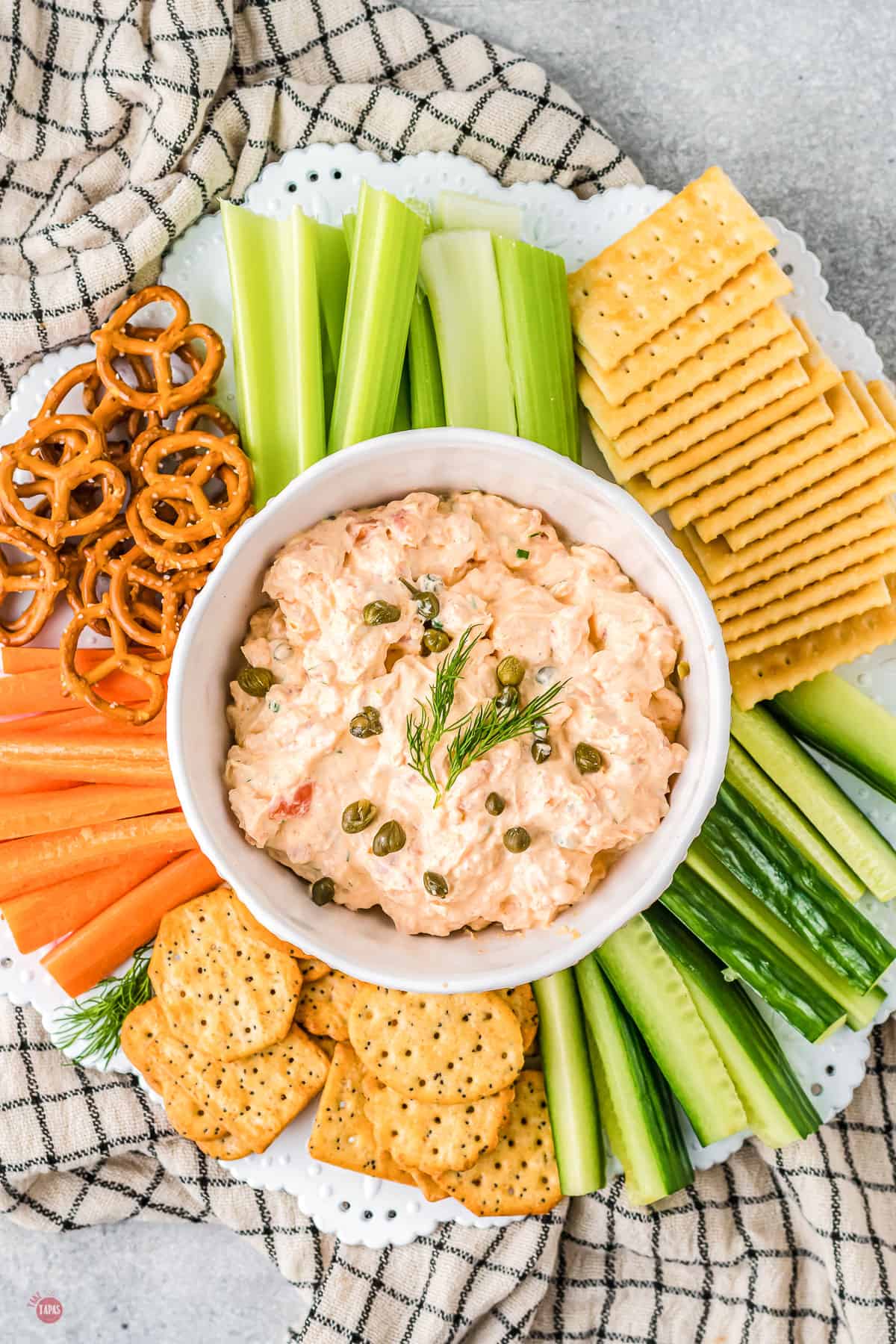 bowl of salmon dip with veggies