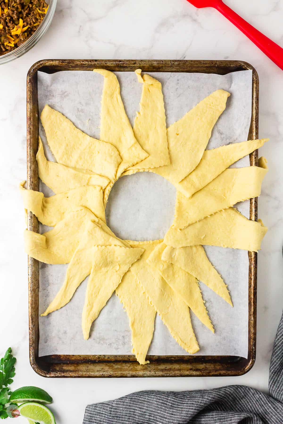 dough triangles on a baking sheet