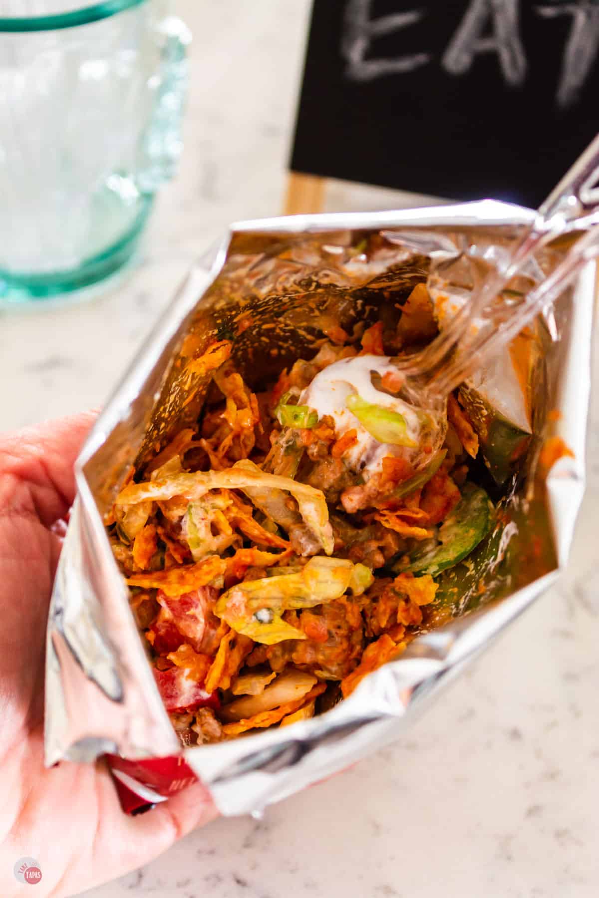 overhead shot of walking taco bag with fork in it