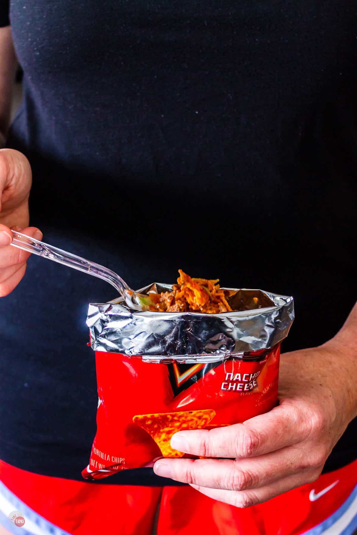 bag of walking taco with fork full of food