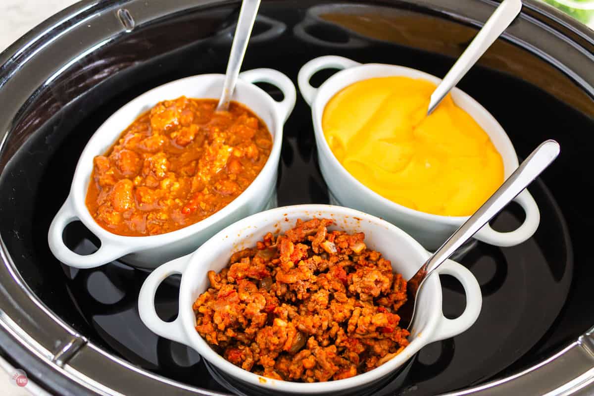 Picture of taco meat, chili and cheese sauce