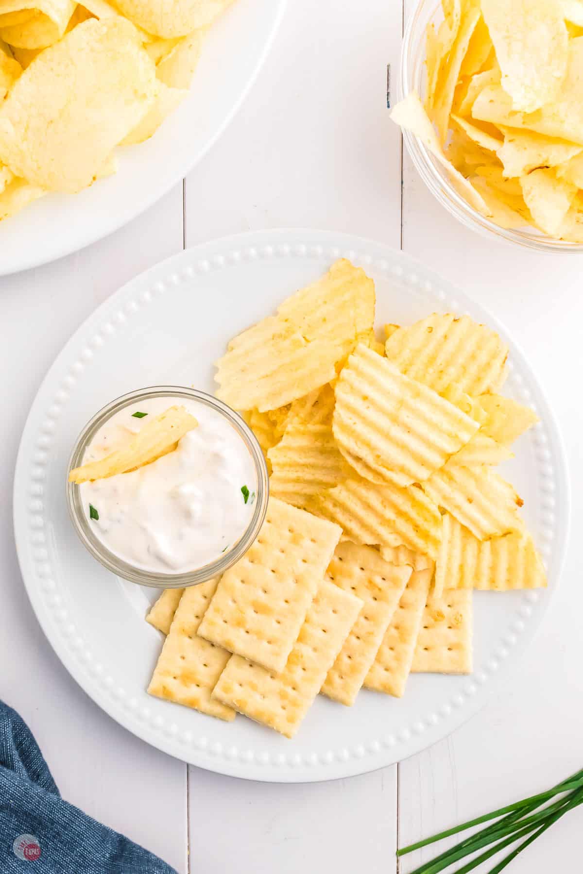 bowl of sour cream dip with chips