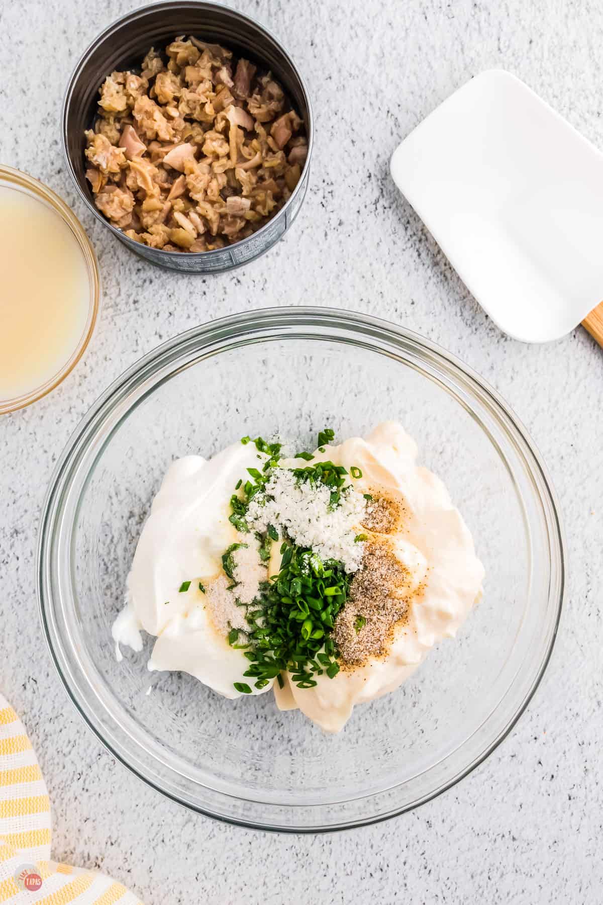 place clams and mayo in a bowl