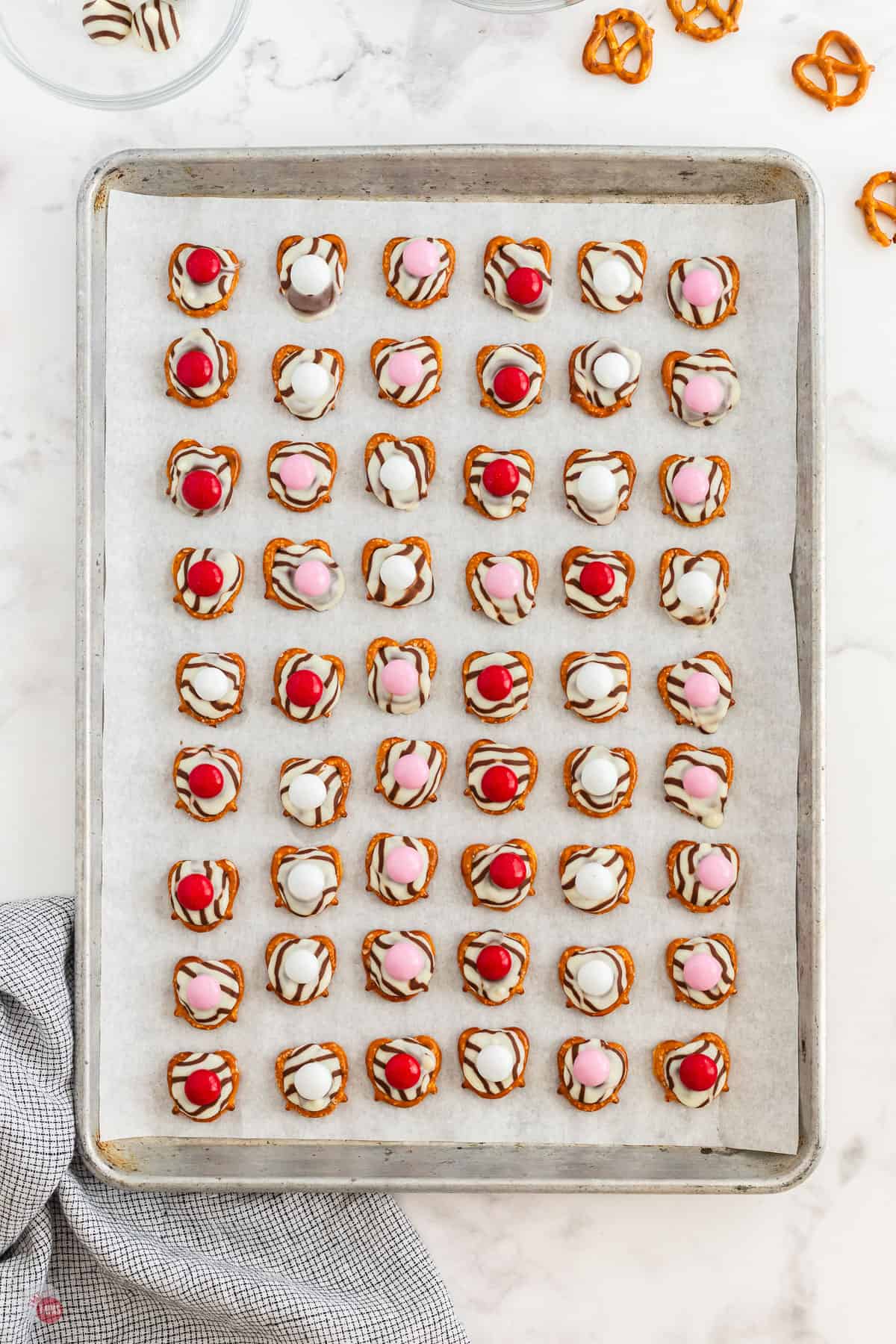 pretzel hugs on a baking sheet