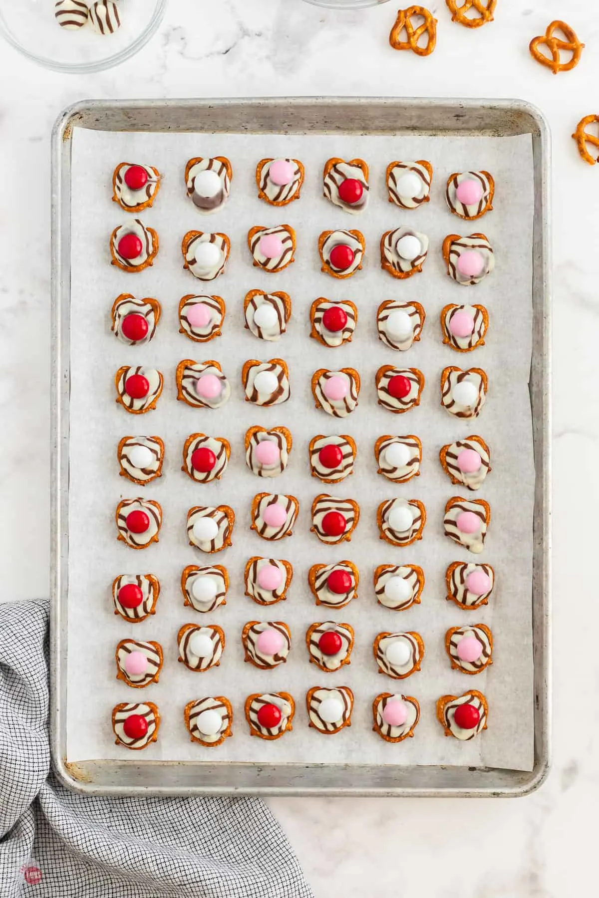 pretzel hugs on a baking sheet