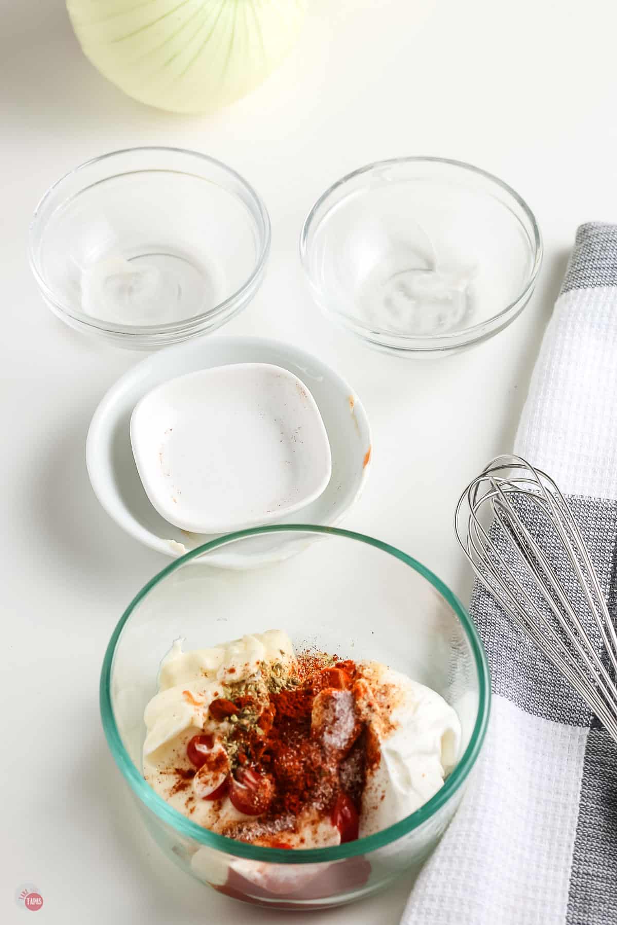 unstirred sauce ingredients in a clear bowl