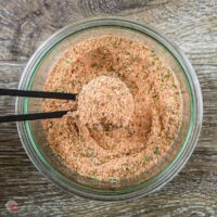 chicken seasoning in a measuring spoon