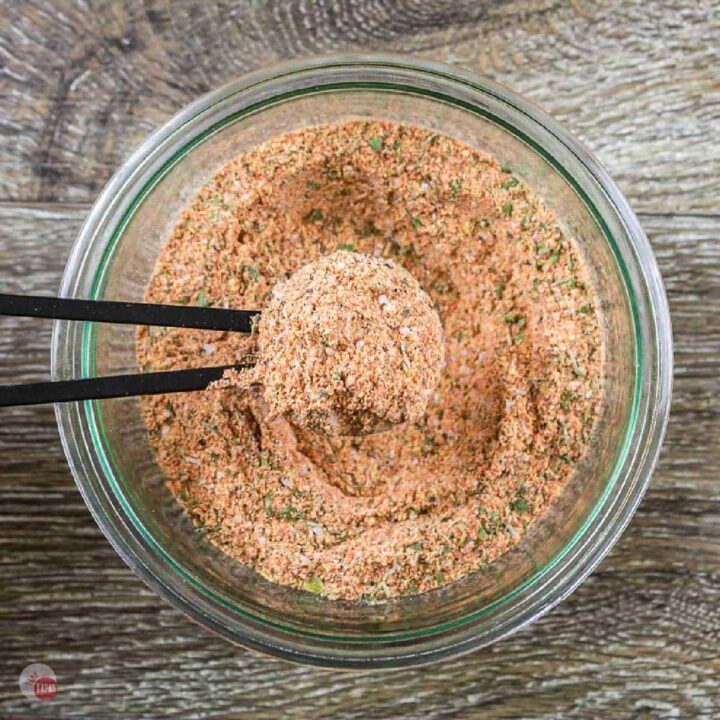 chicken seasoning in a measuring spoon