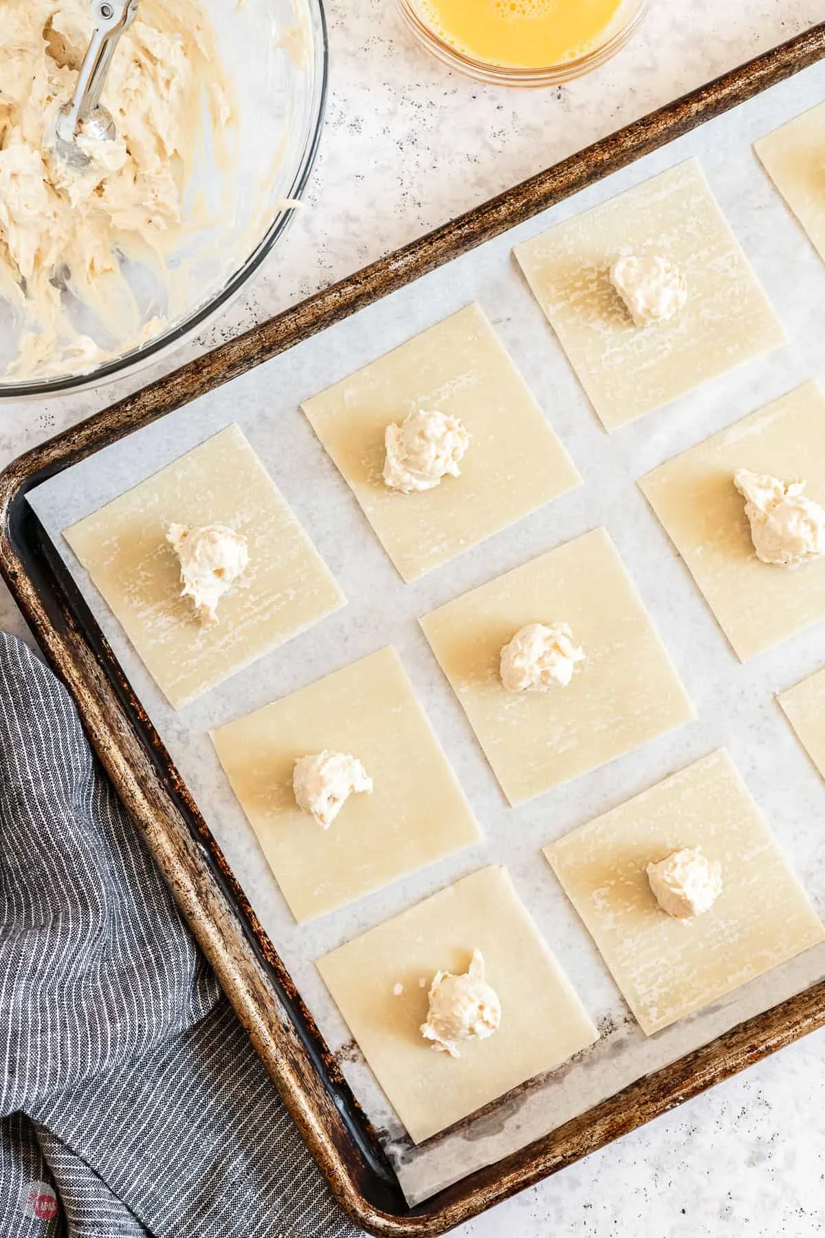 wontons on a baking sheet