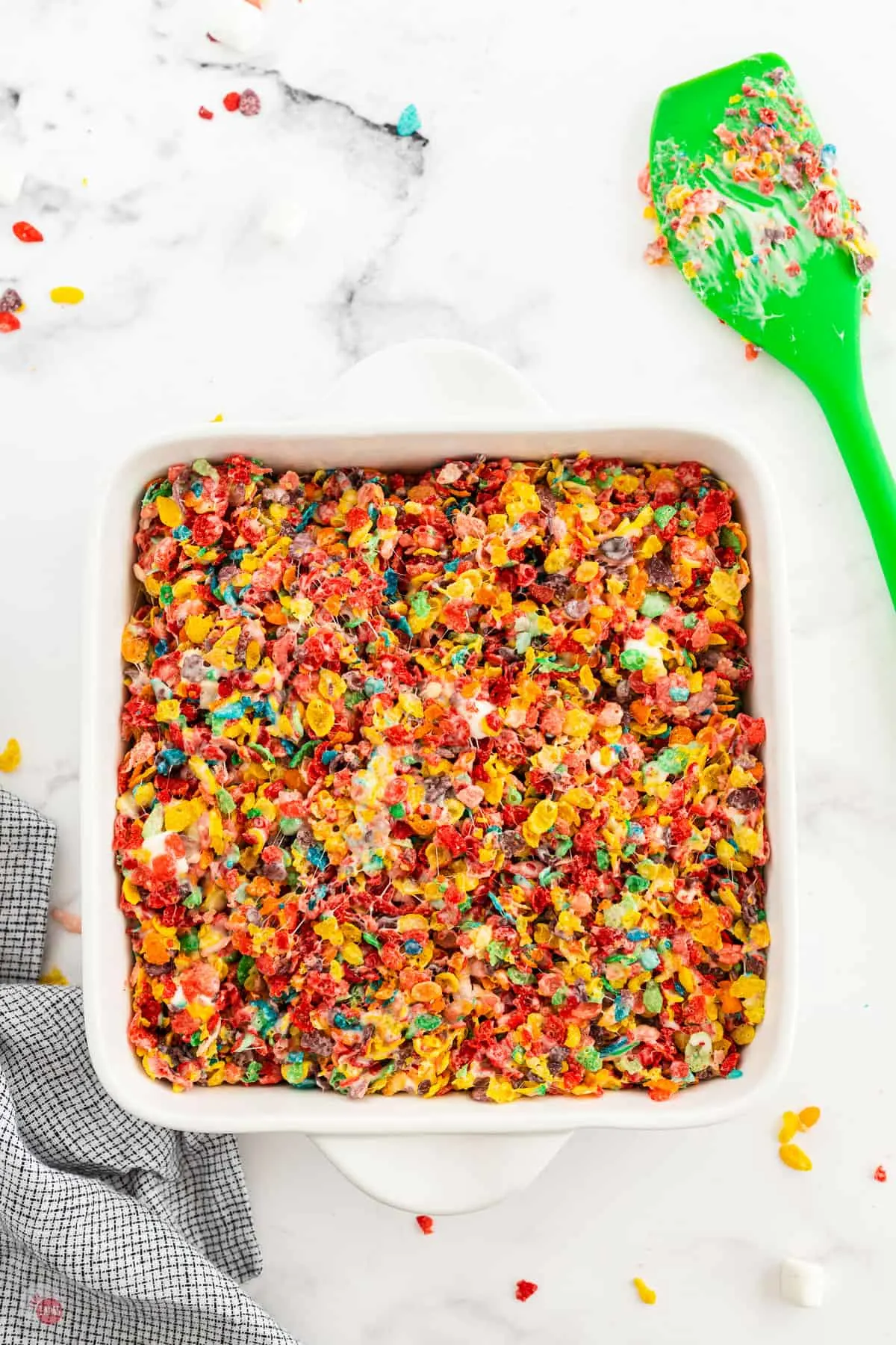 fruity pebbles treats in a white square dish