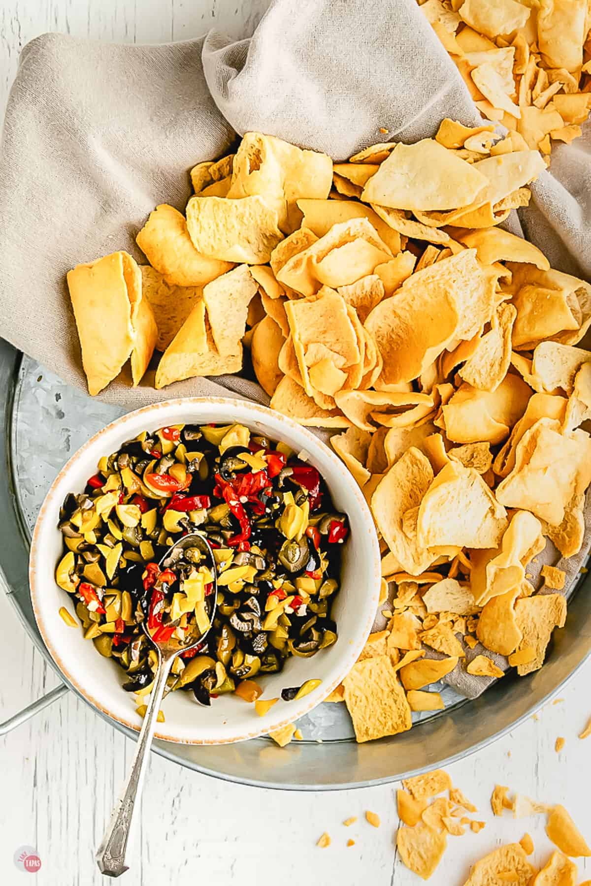 tray of olive salad and chips