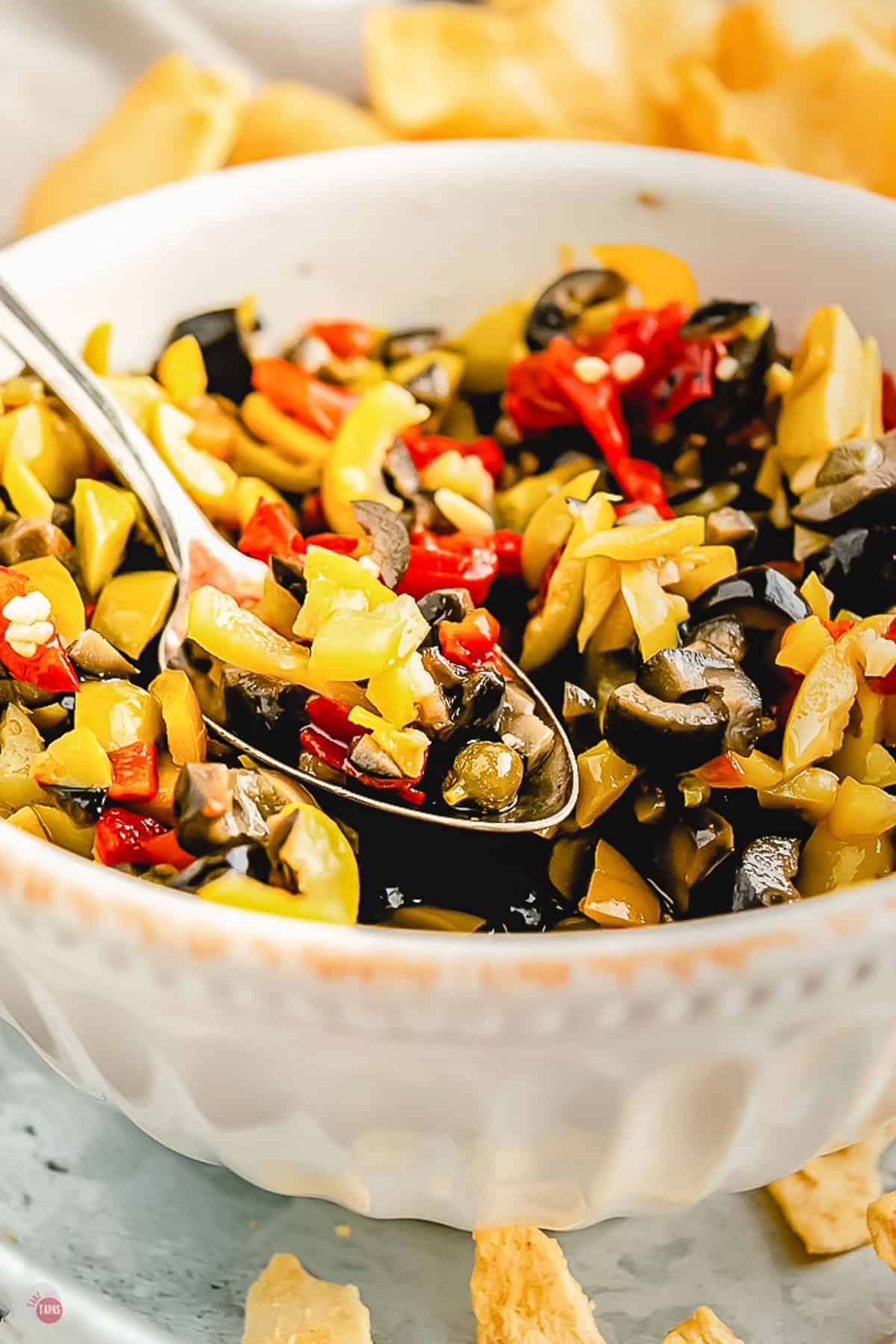 close up of spoon of salad