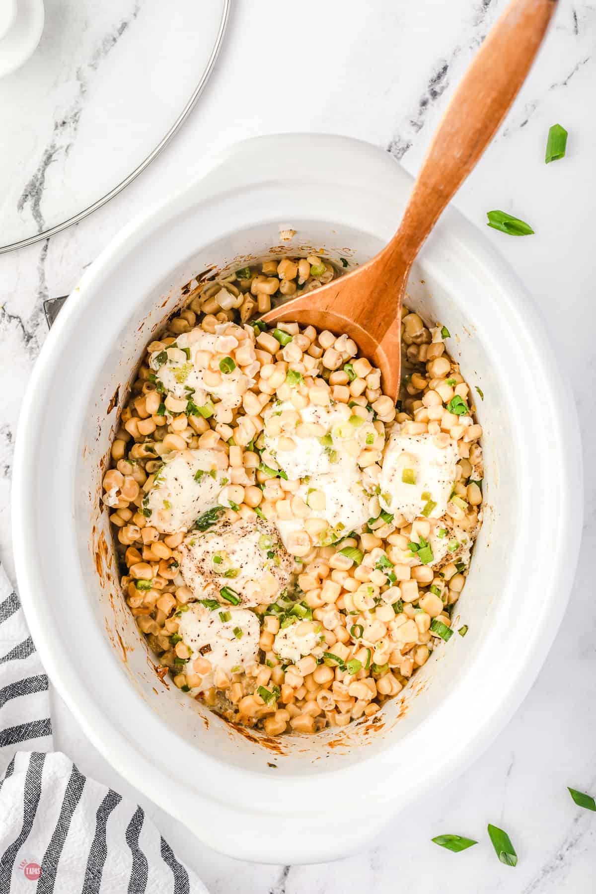 corn and spoon in a bowl