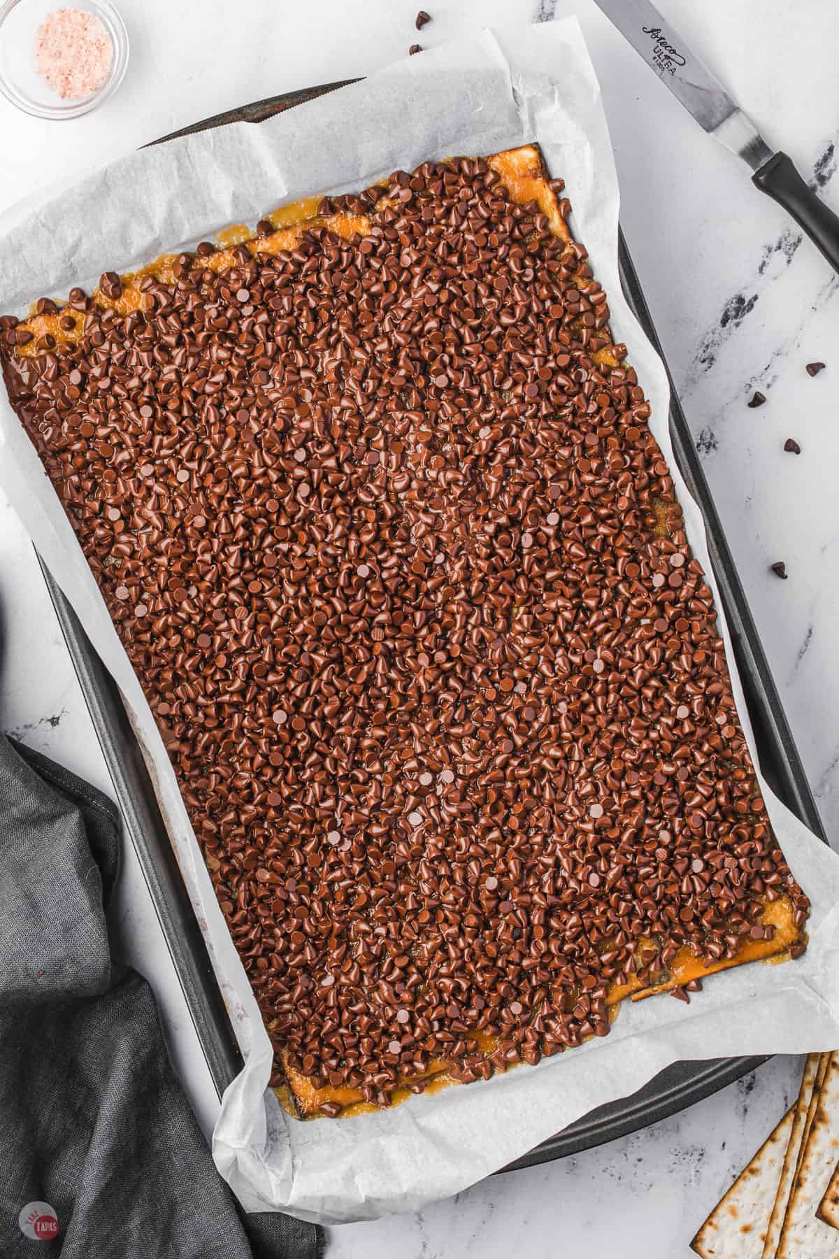 chocolate chips on a baking sheet