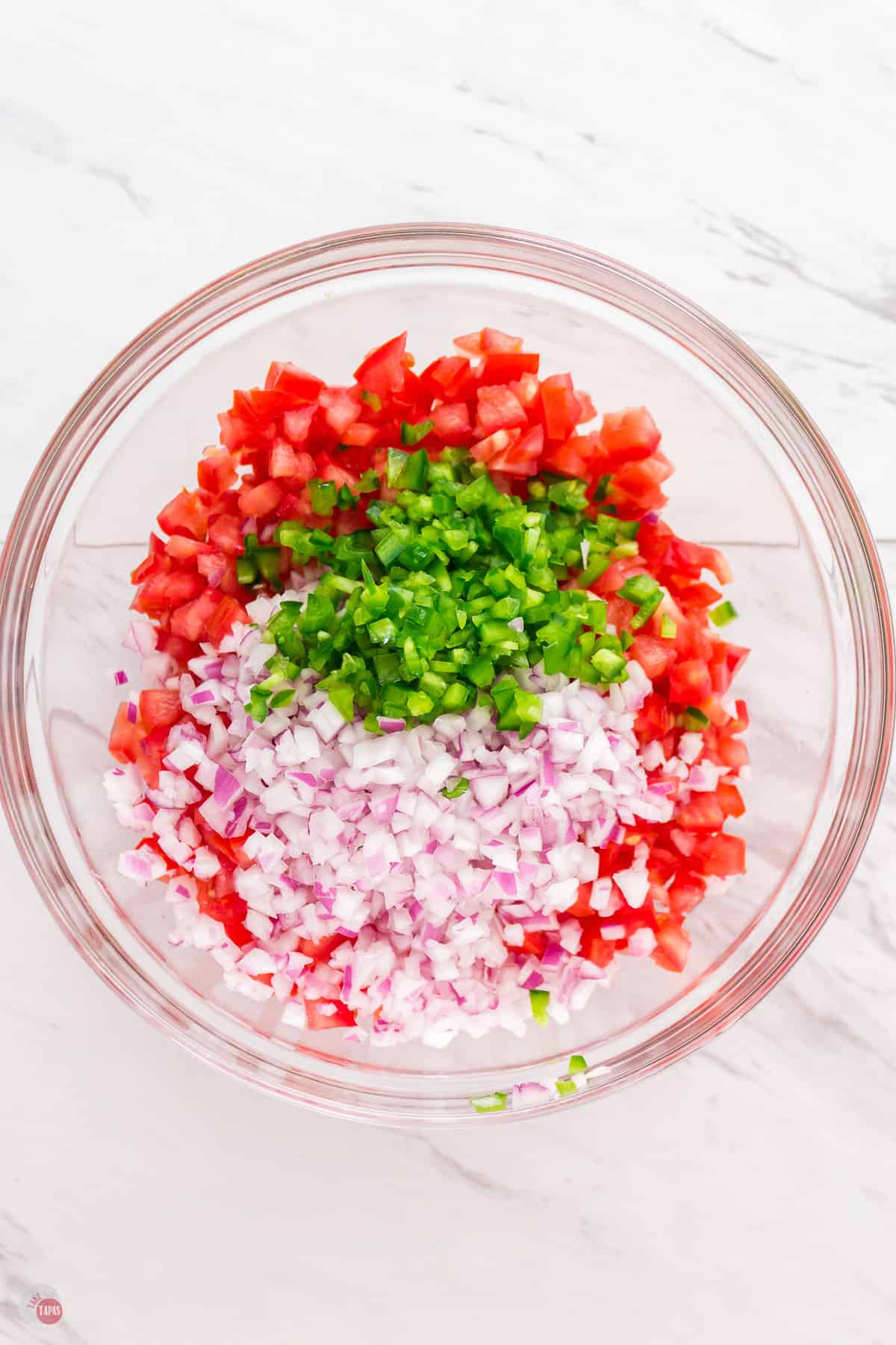 diced tomatoes and onion in a bowl