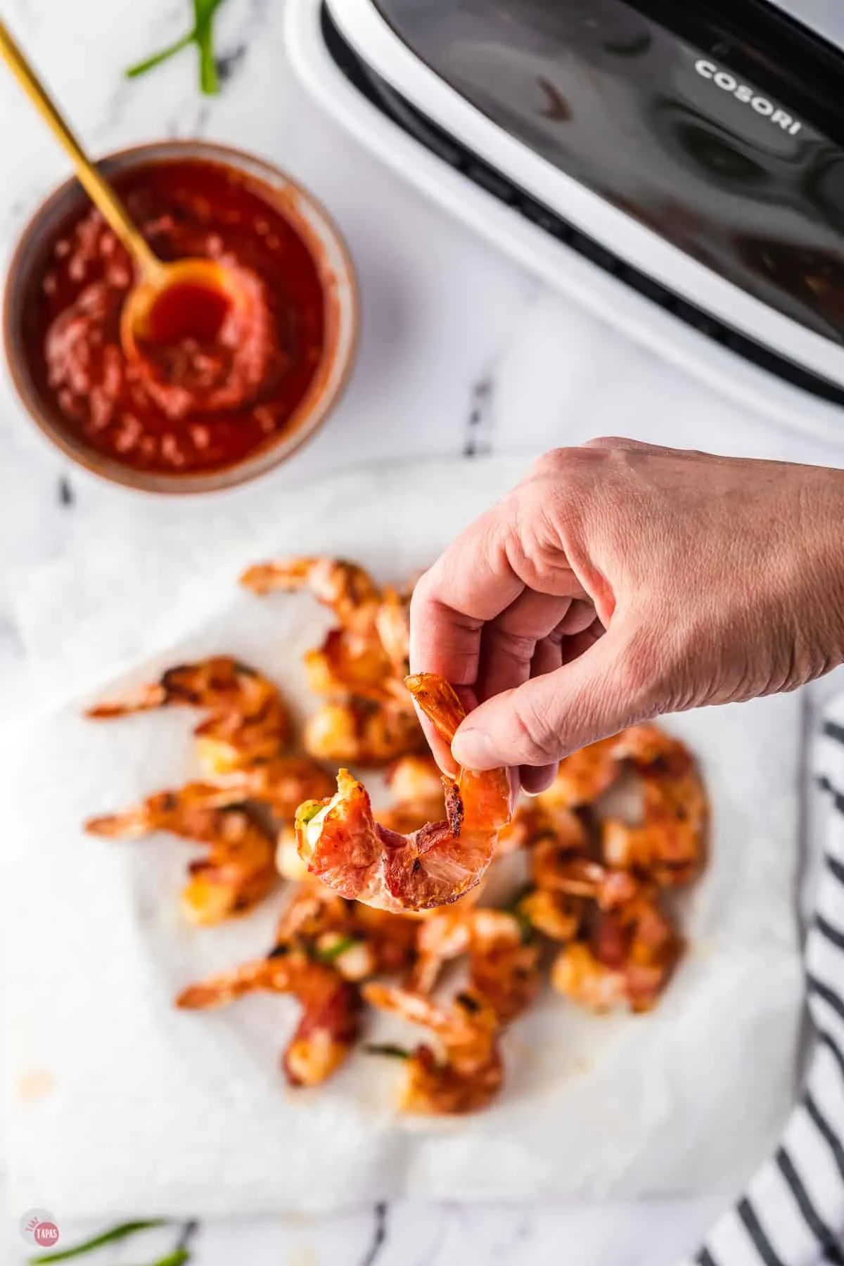 hand holding shrimp