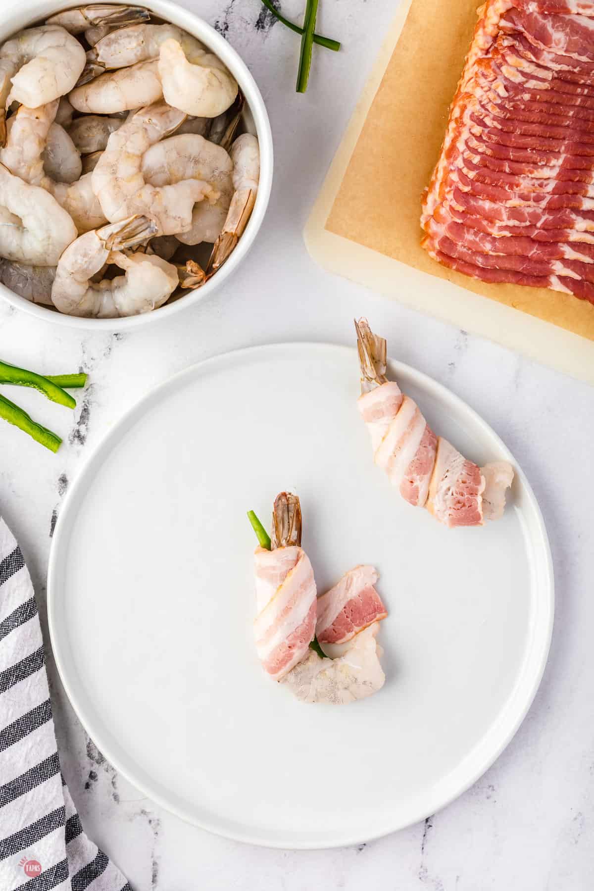 https://www.taketwotapas.com/wp-content/uploads/2022/04/Bacon-Wrapped-Shrimp-RD-Take-Two-Tapas-8.jpg