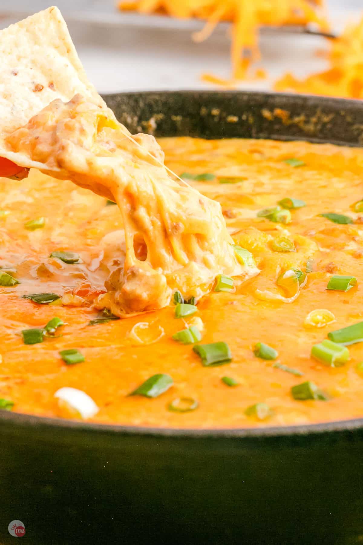 chip pulling dip out of pan