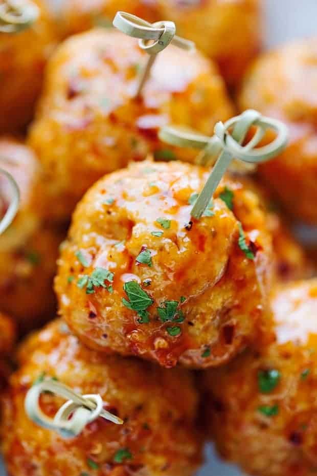 chicken meatballs on bamboo toothpicks with parsley