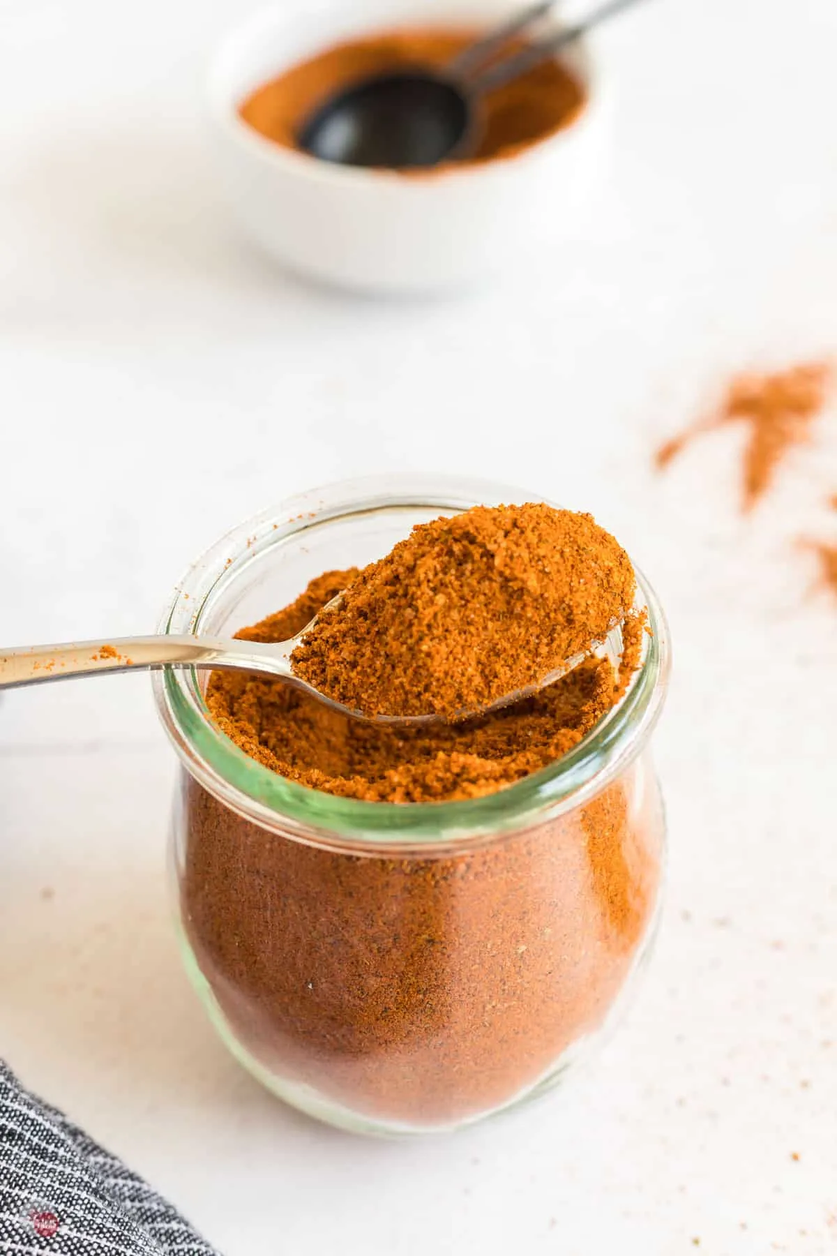 jar of seasoning with spoon