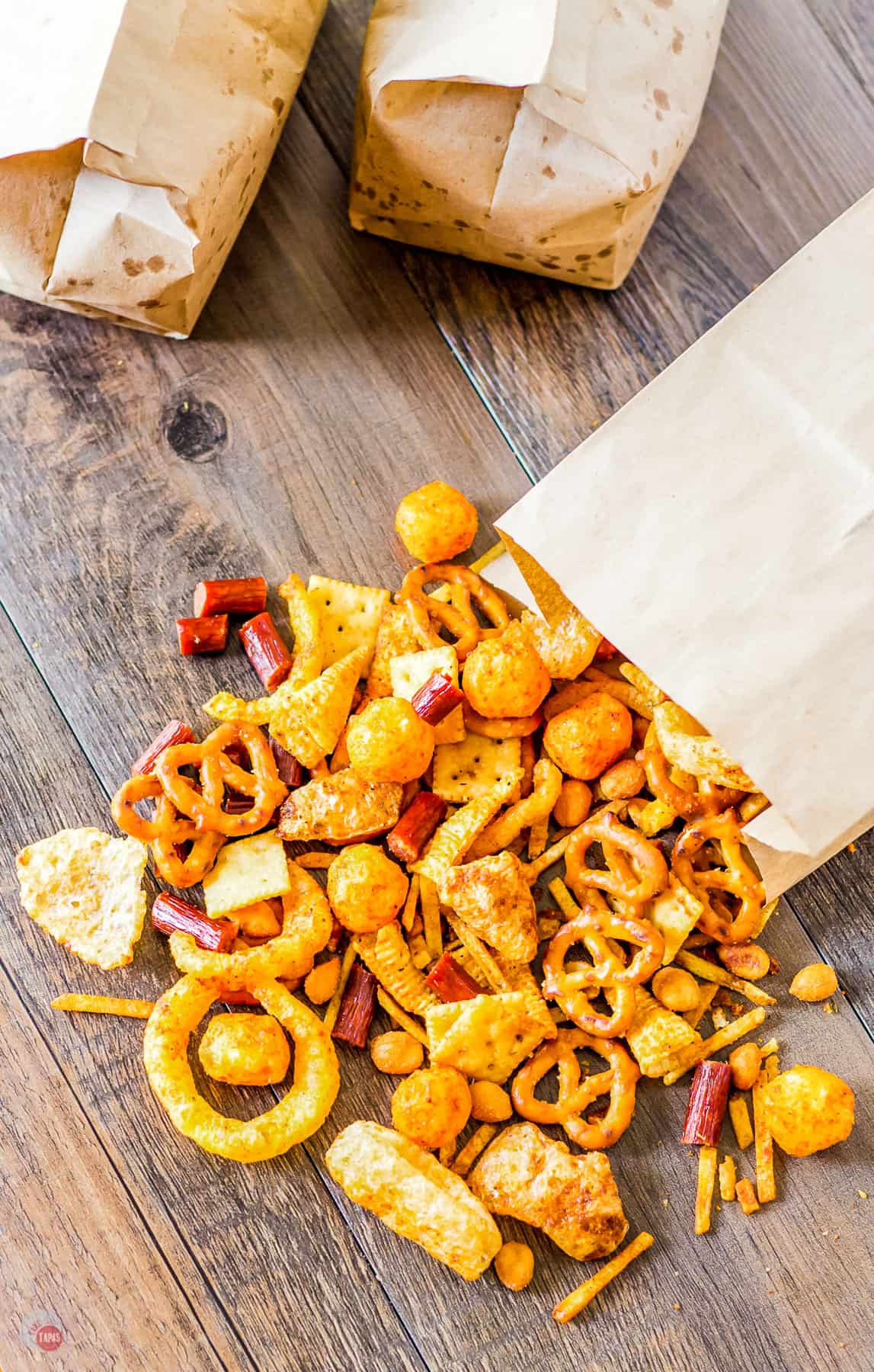 overhead picture of bag with snack mix pouring out