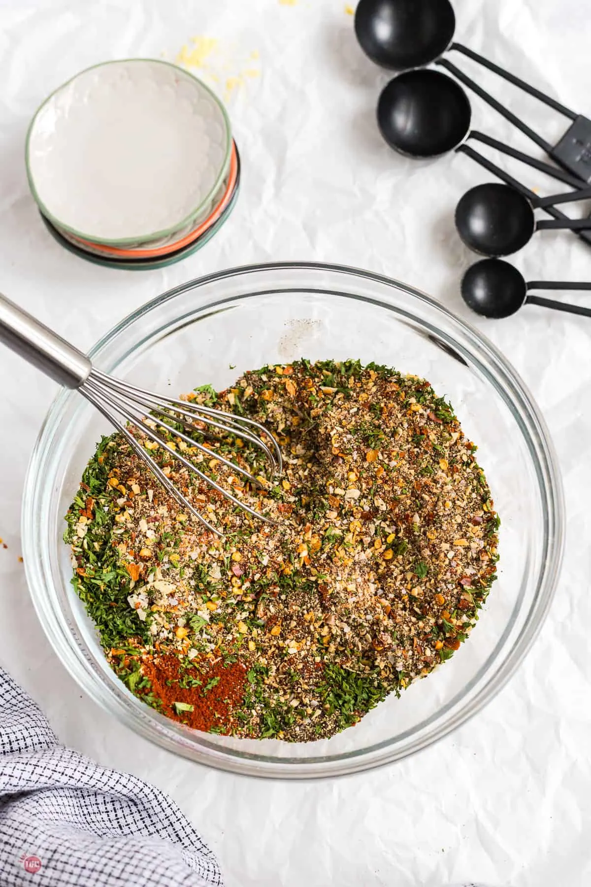 spices in a bowl with a whisk