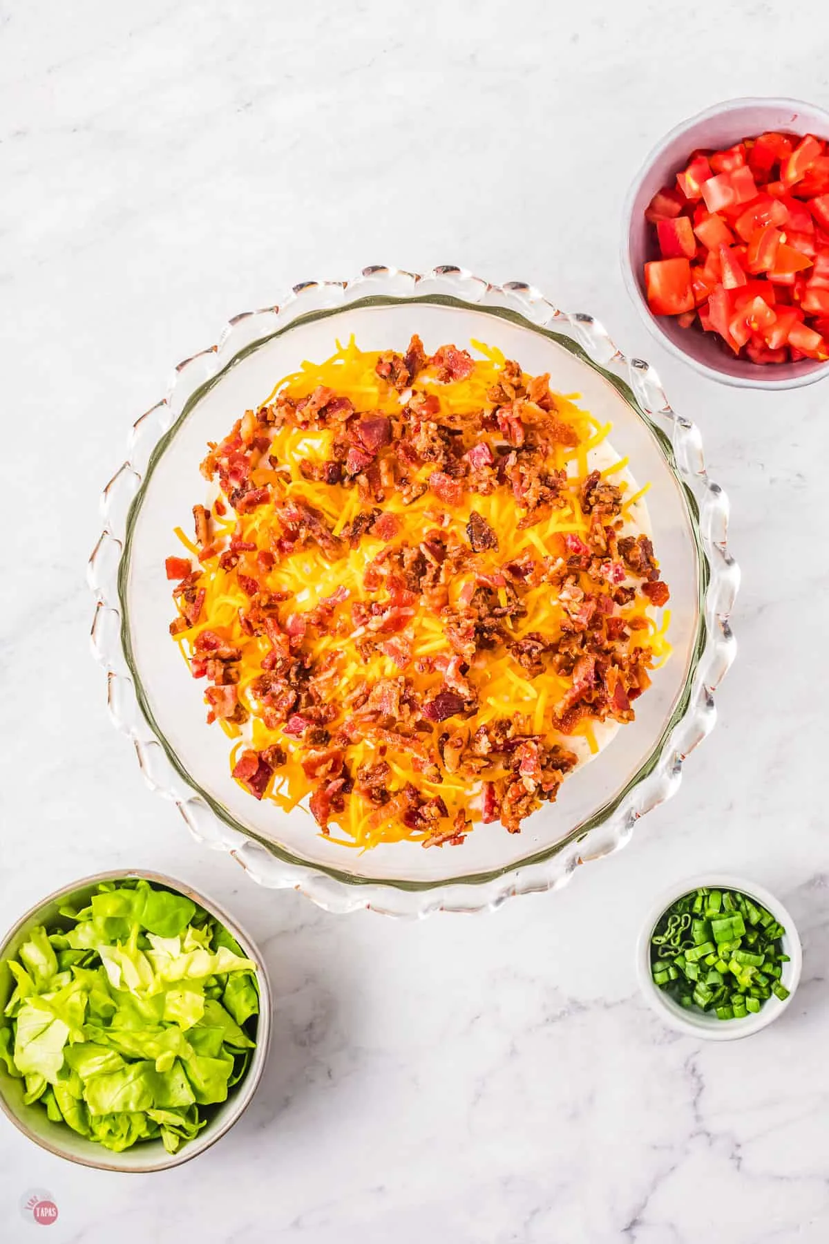 baked cheese and bacon in a bowl