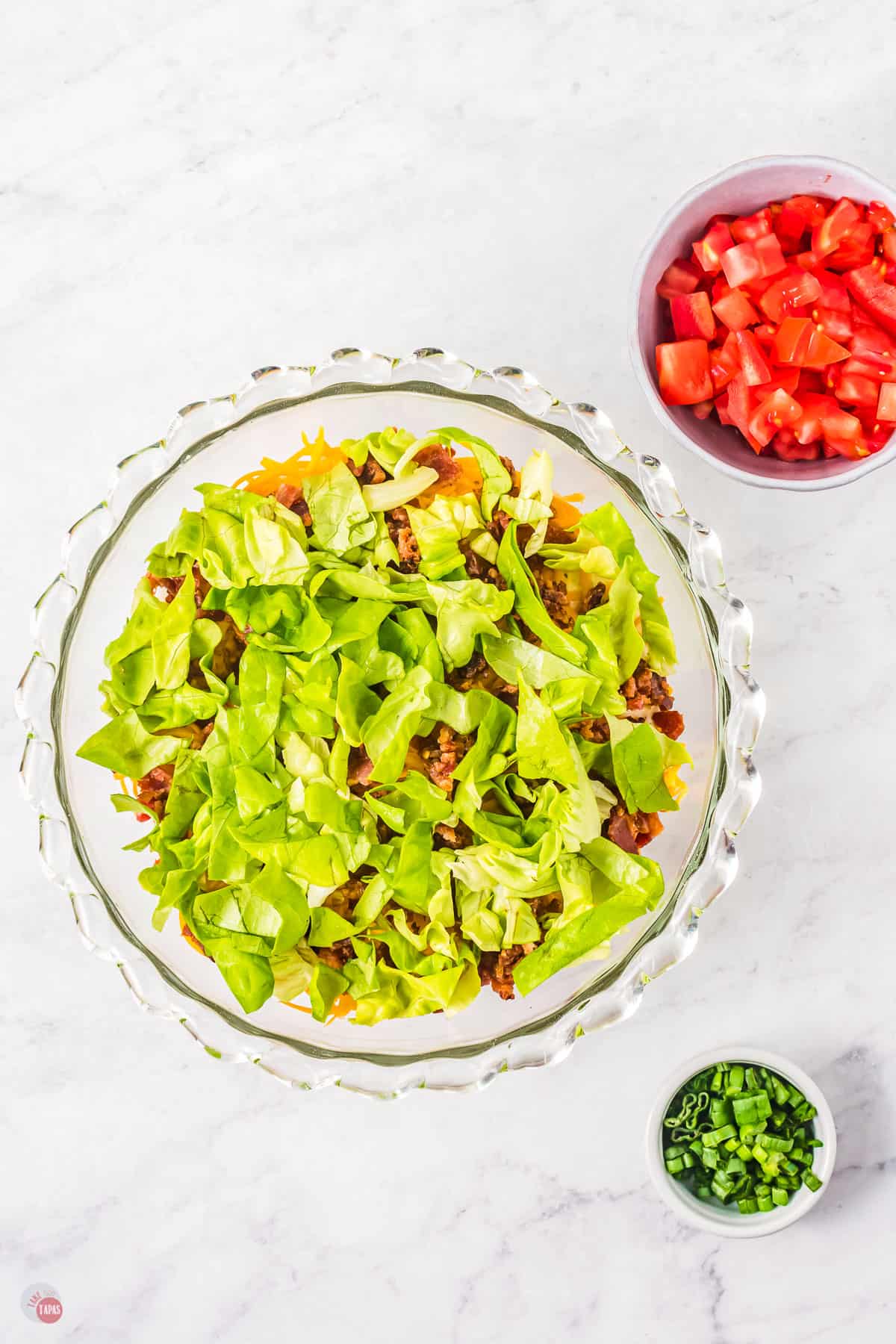 lettuce and tomatoes in a bowl