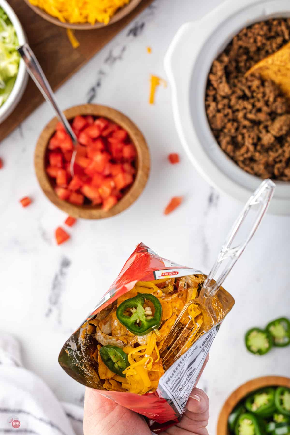 walking taco with a fork in a bag