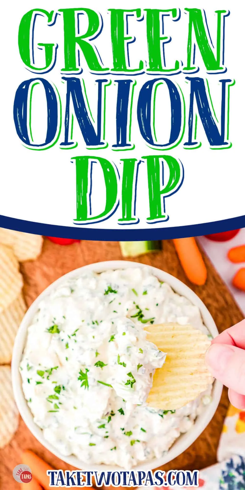 Top view of a small white bowl on a worktop filled with green onion dip garnished with parsley with a chip being lifted in mid-air that has some dip on it. There is a textbox at the top saying "Green Onion Dip".