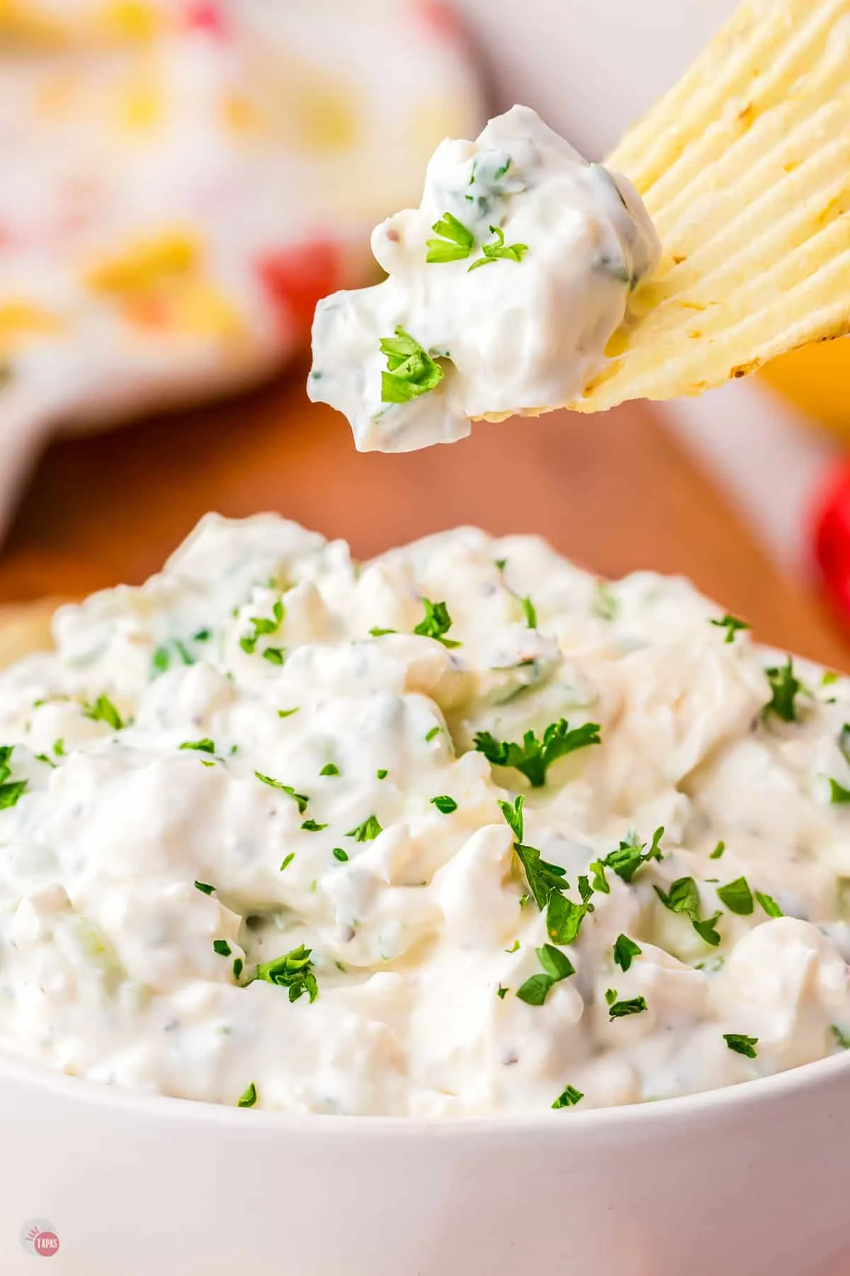 ruffle chip in green onion dip