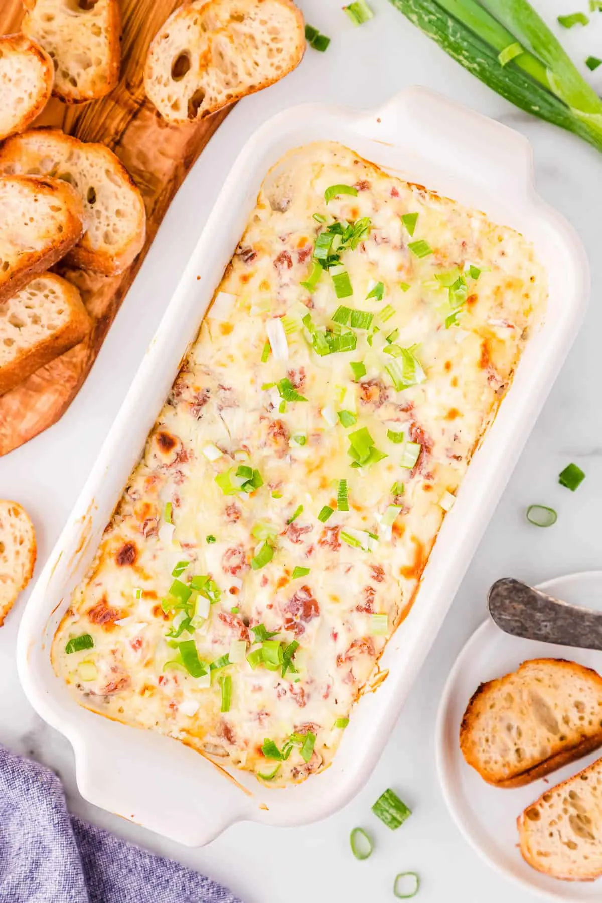 baked boudin dip in a white bowl
