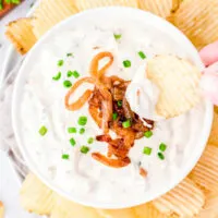 bowl of French Onion Dip with a potato chip