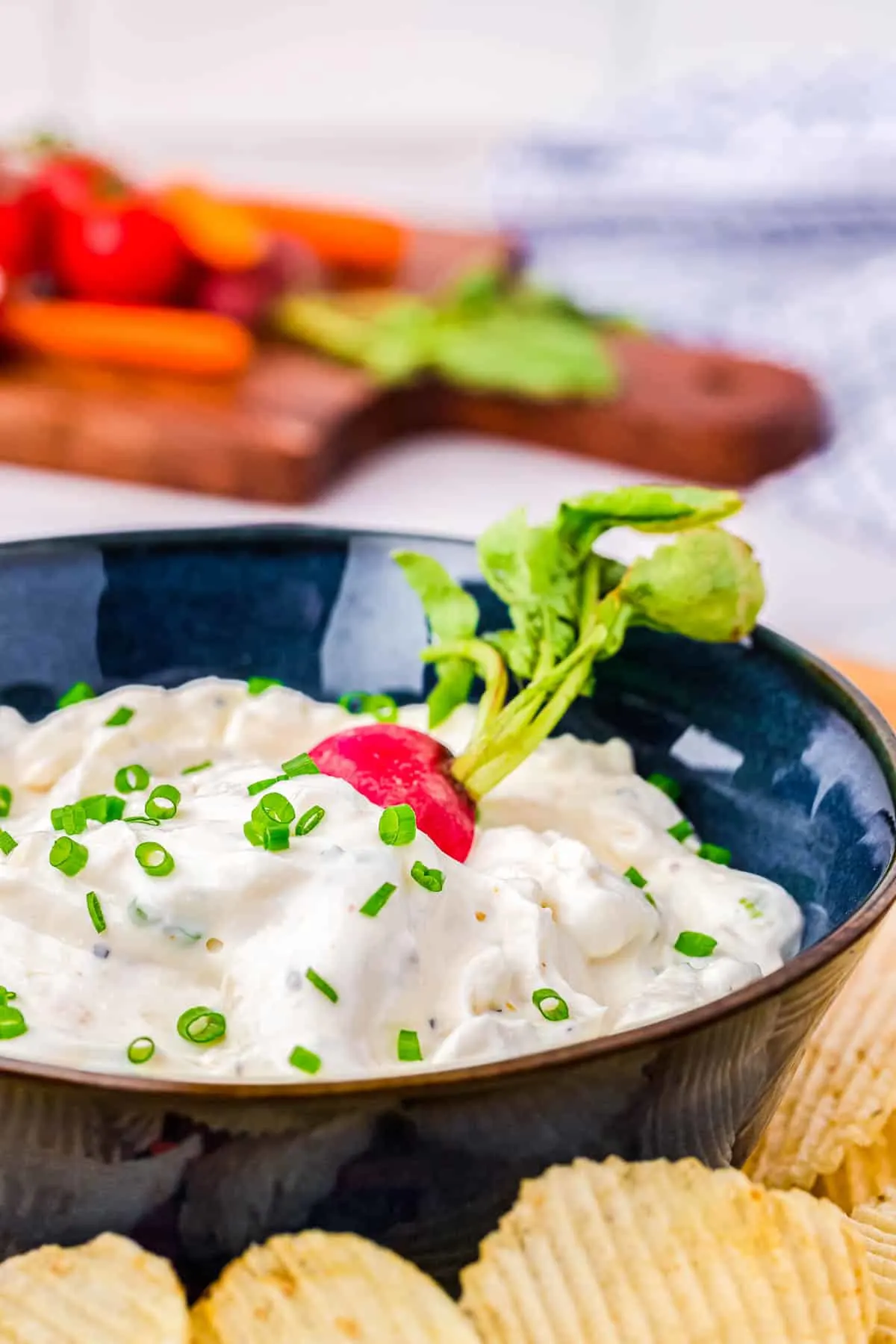 side view of dip with a radish in it