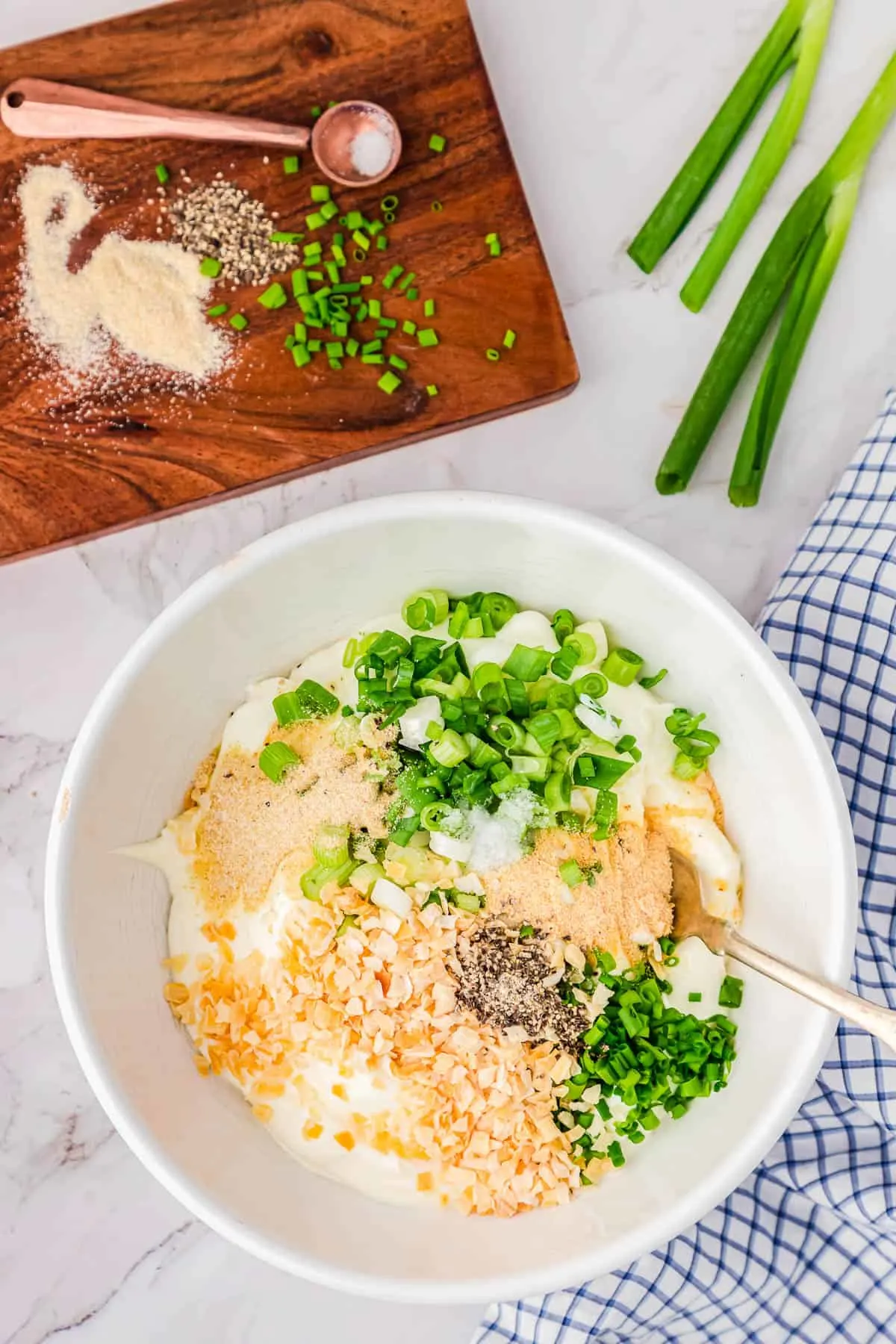 white bowl of sour cream and spices