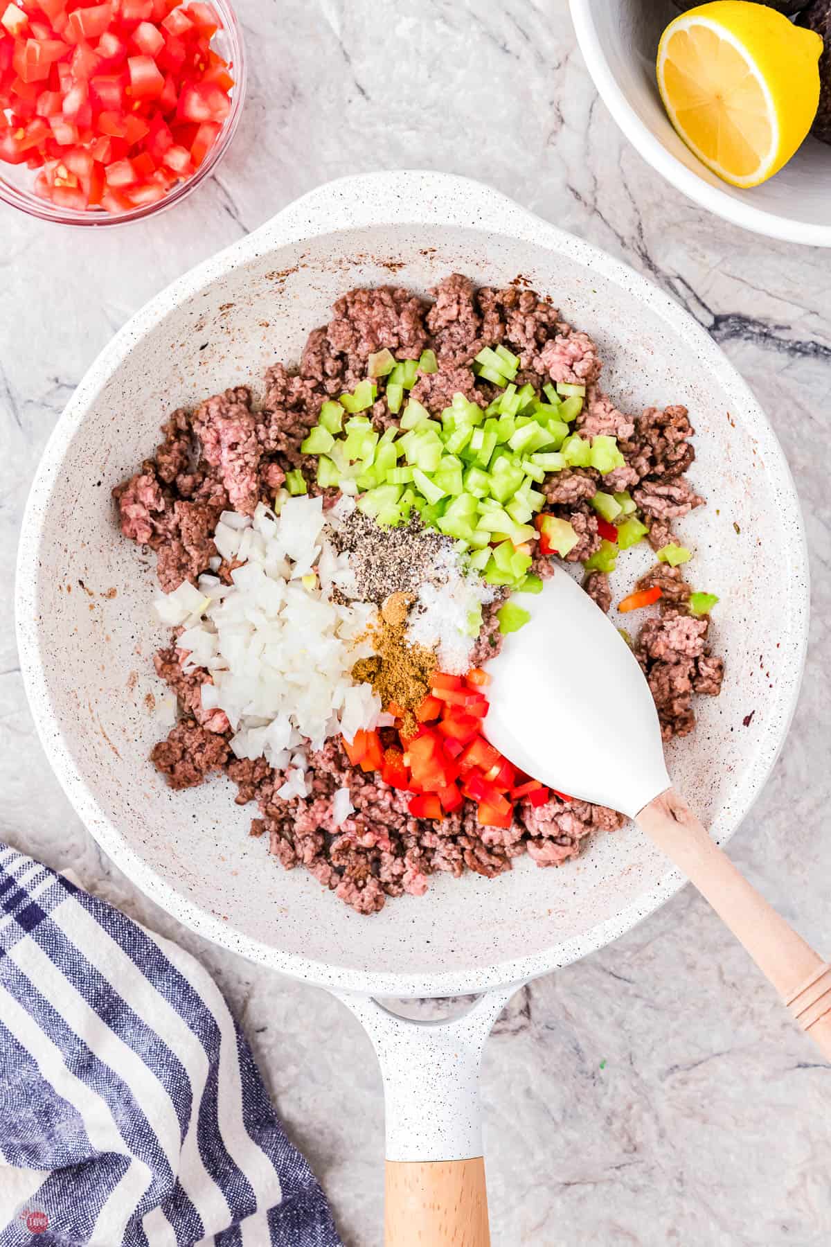 ground beef and veggies in a skillet