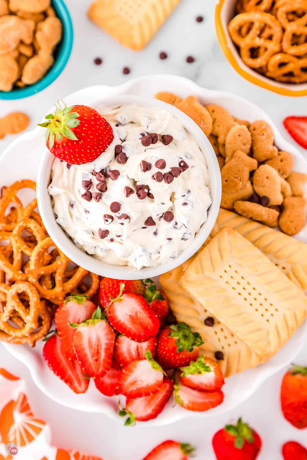 overhead picture of bowl of Booty dip surrounded by crackers and pretzels