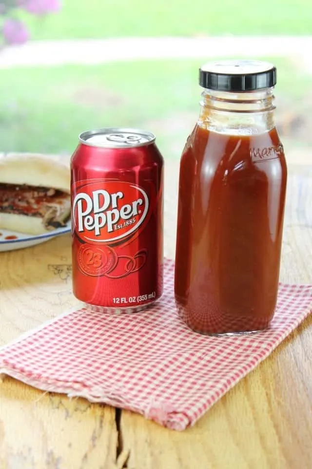 jar of sauce next to a can of Dr. Pepper soda