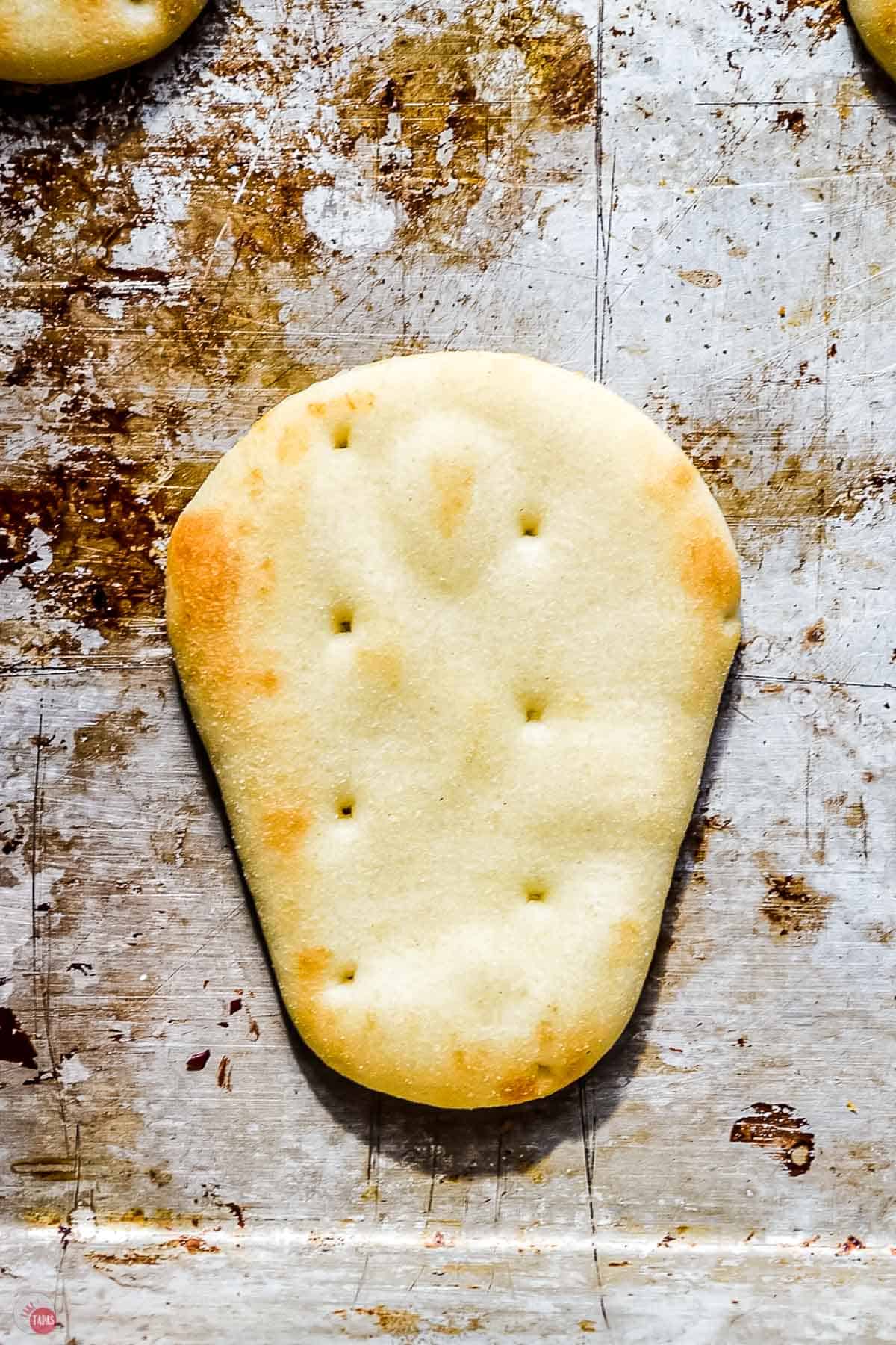 naan dipper on baking sheet