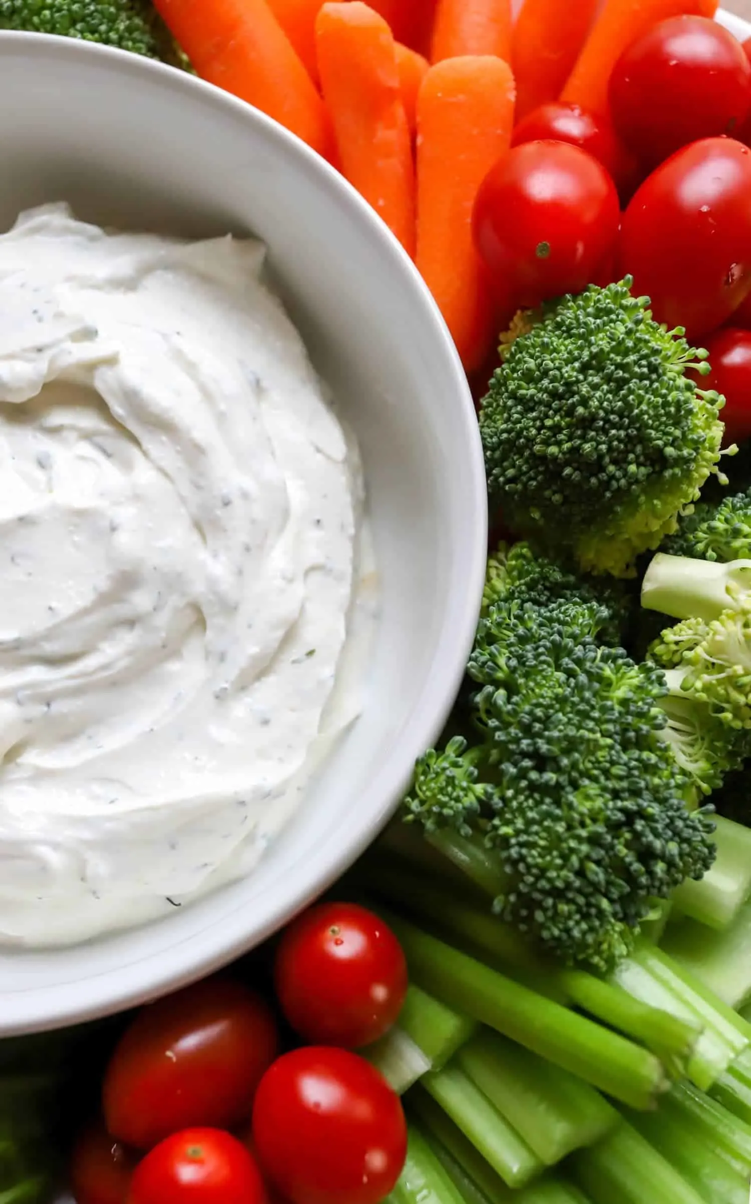close up of dill ranch dip and broccoli