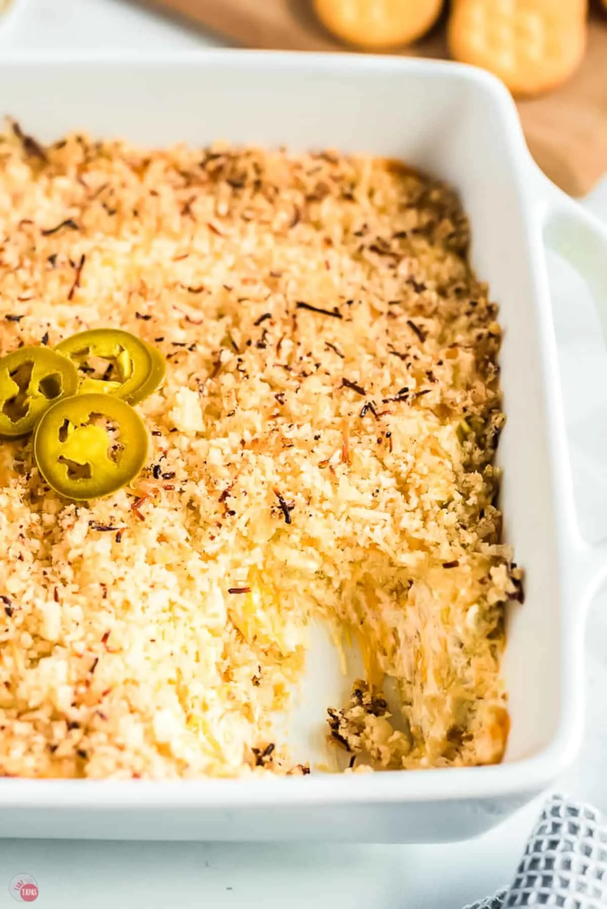 jalapeno popper dip in a square white dip