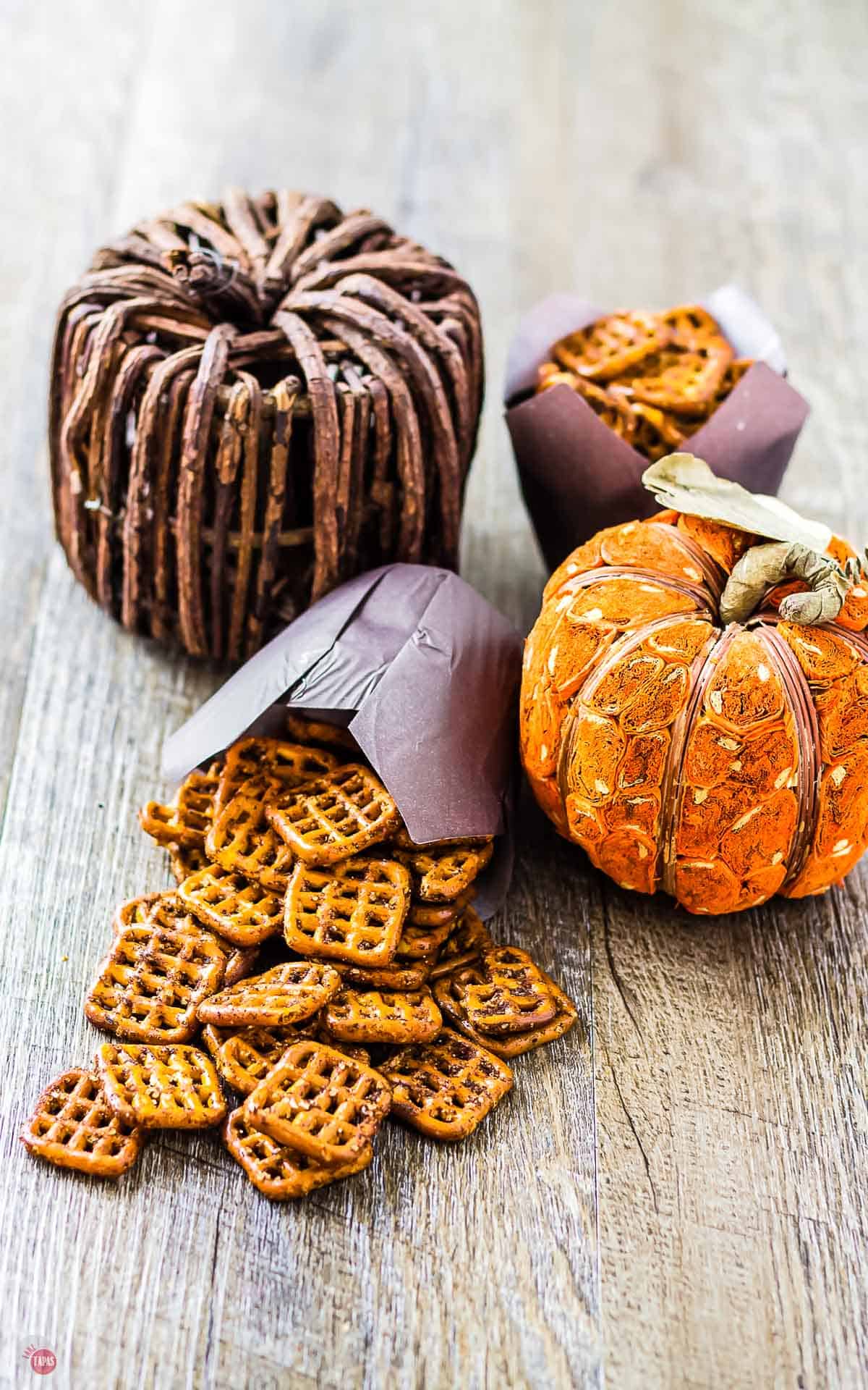 pumpkin pretzels pouring out of cupcake liner