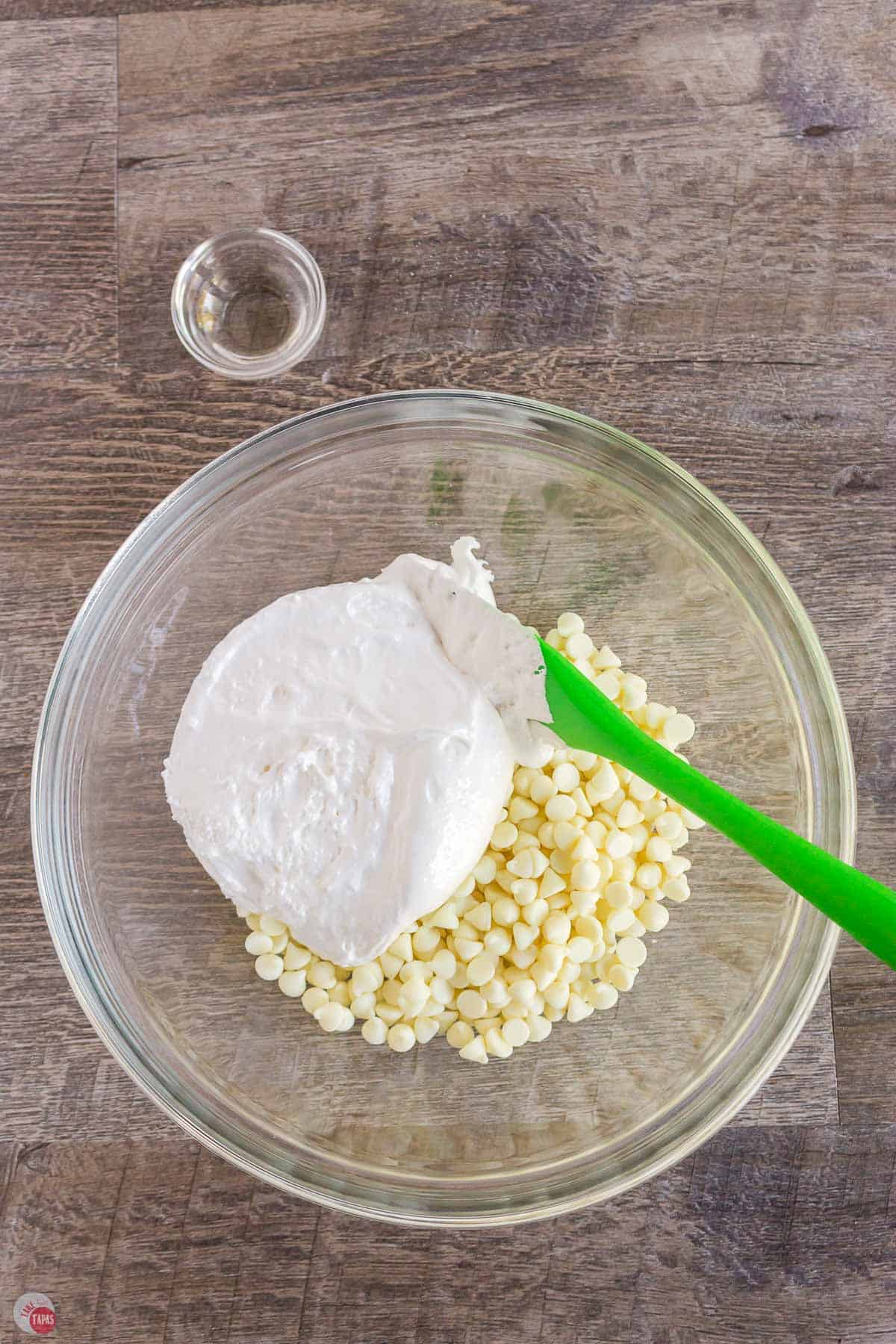 marshmallow and chocolate chips in a clear bowl