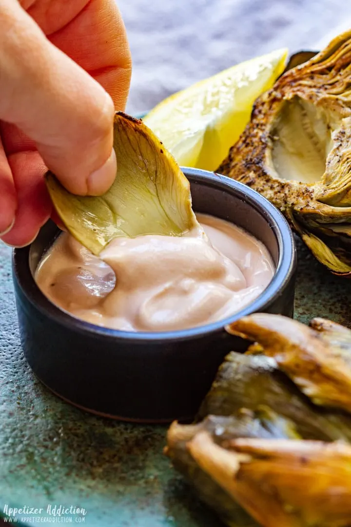 simple garlic dip in a black bowl