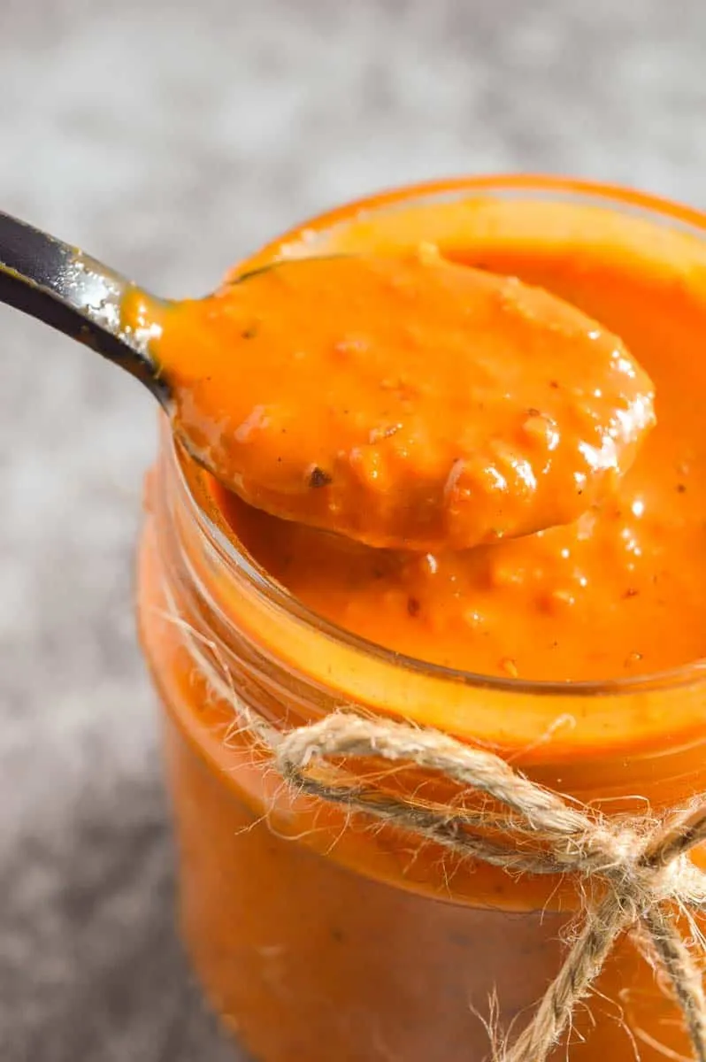 peri peri sauce in a spoon and jar