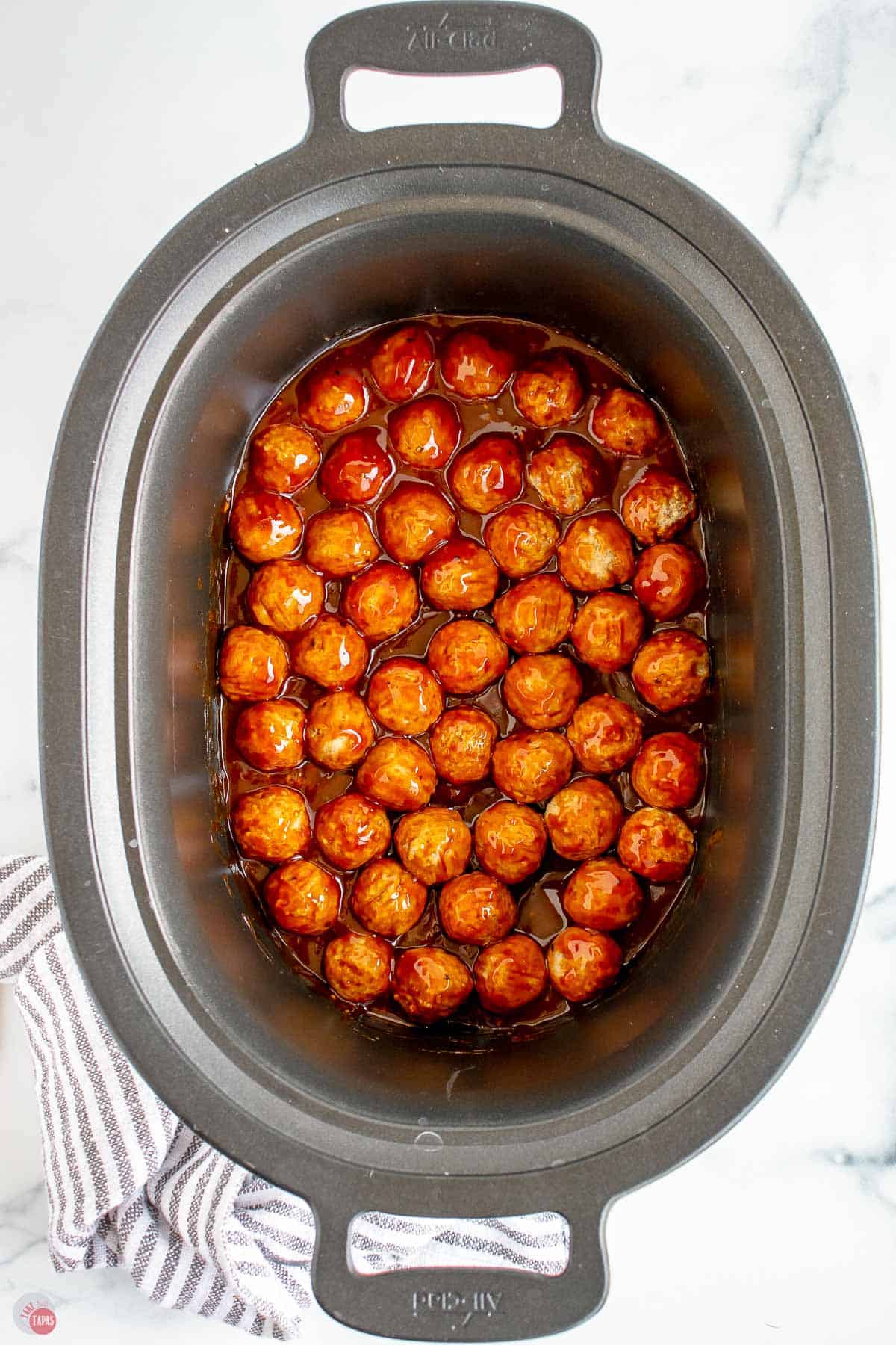 meatballs and sauce in a slow cooker