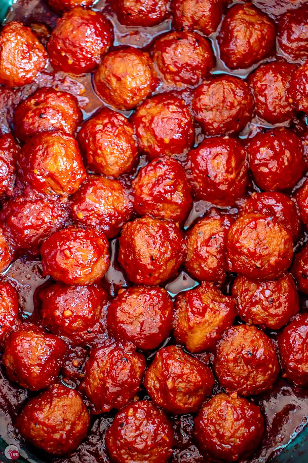 close up of meatballs in a crockpot