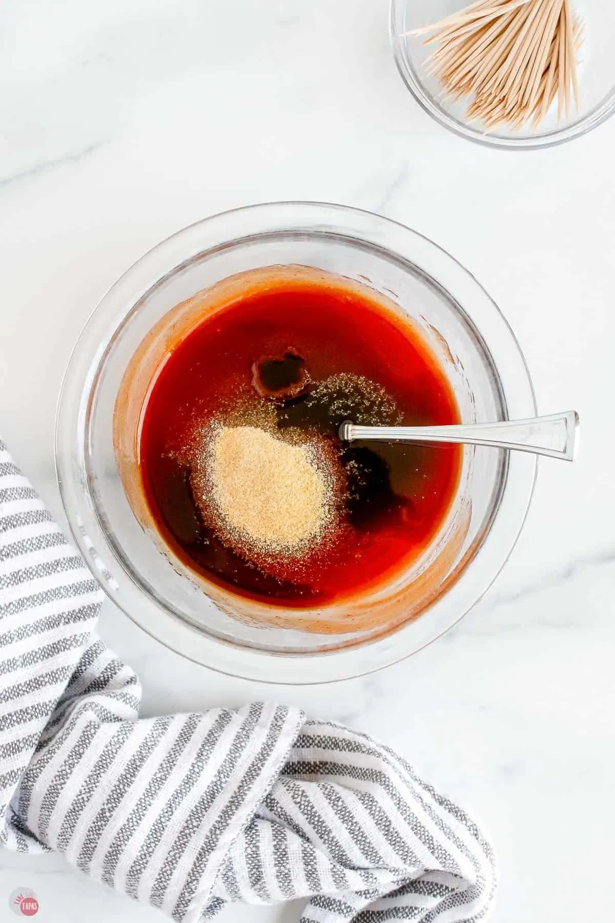 unmixed bbq sauce in a clear bowl