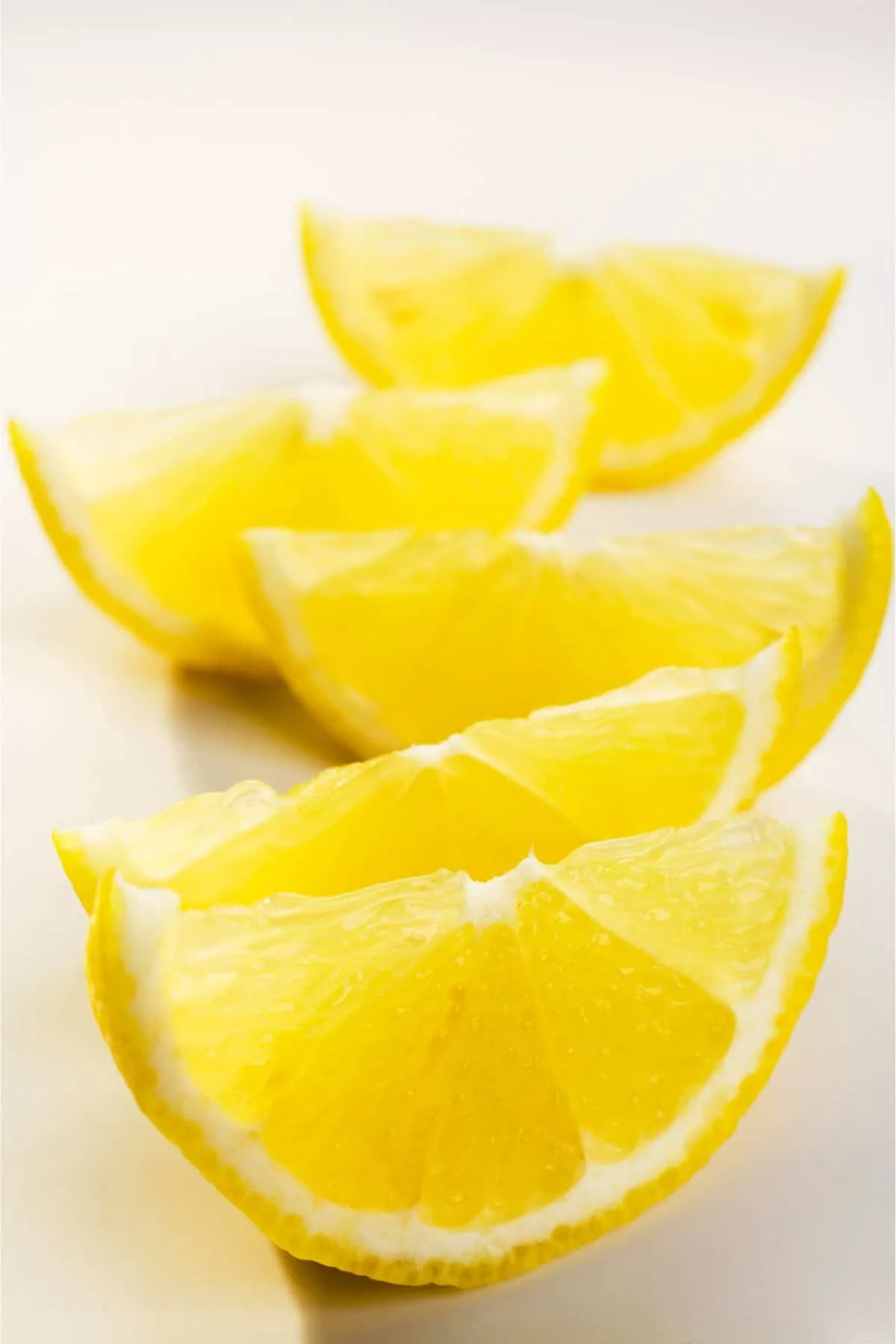 lemon wedges on a white background