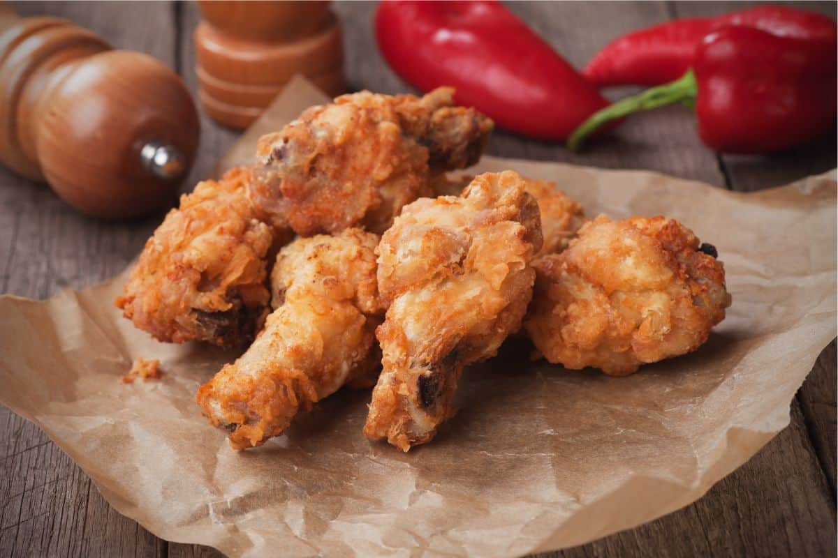 stack of wings on parchment paper